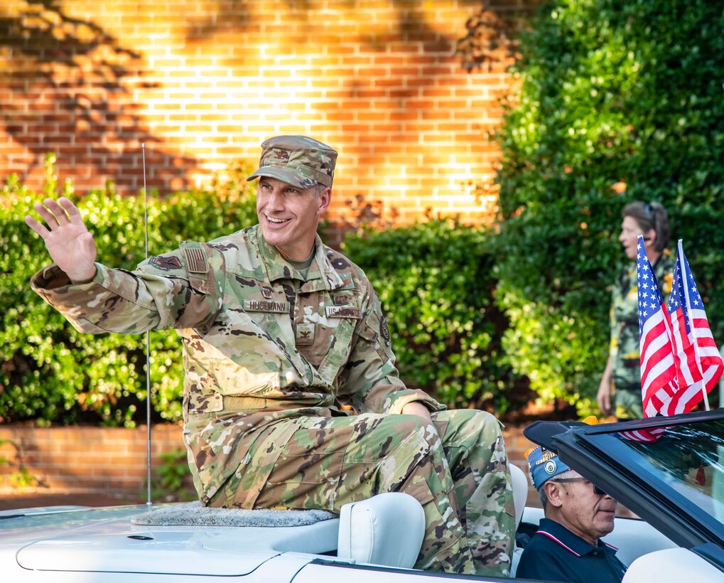 Col. Matt Husemann, 436th Airlift Wing commander, waves to the crowd during the annual Fourth of July Celebration parade in Dover, Delaware, July 4, 2021. Husemann served as grand marshal during the event. (U.S. Air Force photo by Senior Airman Stephani Barge)
