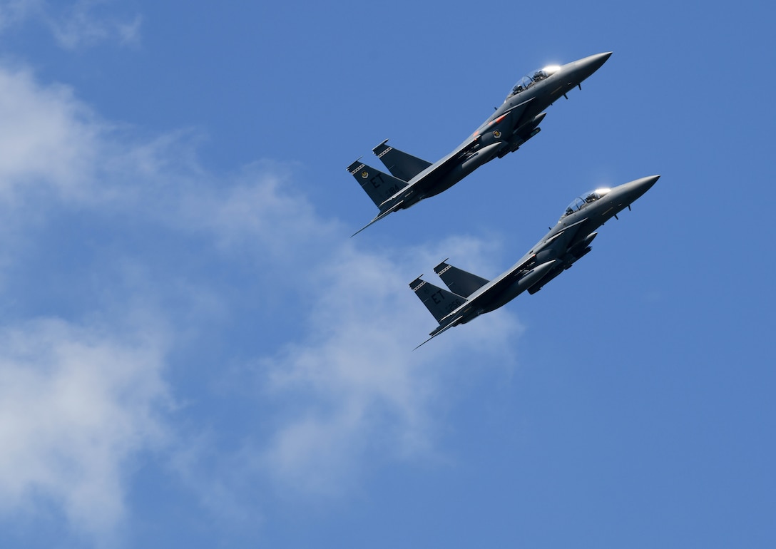 A pair of F-15 Eagles from the 96th Test Wing out of Eglin Air Force Base, Florida, fly over Arnold Air Force Base during a retreat ceremony after the Arnold Engineering Development Complex “Hap Arnold Day” 70th Anniversary Celebration Open House, June 26, 2021, at Arnold AFB, Tenn. (U.S. Air Force photo by Jill Pickett)