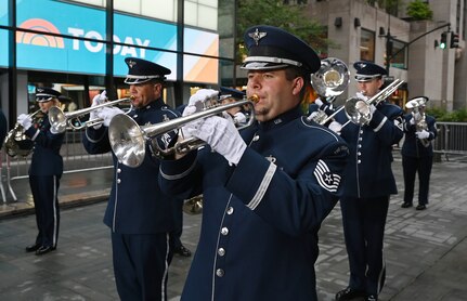 U.S. Air Force Tech. Sgt. Mike Brest, a trumpet player assigned to The United States Air Force Band’s Ceremonial Brass, plays during a live broadcast on the TODAY Show in New York City July 2, 2021. The official ceremonial ensemble comprises 41 active-duty Airmen who provide musical support for funerals at Arlington National Cemetery, arrivals for foreign heads of state at the White House and Pentagon, patriotic programs, changes of command, retirements, and awards ceremonies. (U.S. Air Force photo by Staff Sgt. Kayla White)