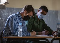 U.S. Army Soldiers, assigned to 404th Civil Affairs Battalion and the Moroccan Gendarmerie, conduct a mass-screening event in Tifnit, Morocco, on June 13, 2021. Africa Lion 2021 is U.S. Africa Command’s largest, premier, joint, annual exercise hosted by Morocco, Tunisia, and Senegal, 7-18 June. More than 7,000 participants from nine nations and NATO train together with a focus on enhancing readiness for U.S. and partner nation forces. Africa Lion 21 is a multi-domain, multi-component, and multinational exercise, which employs a full array of mission and capabilities with the goal to strengthen interoperability among participants.
