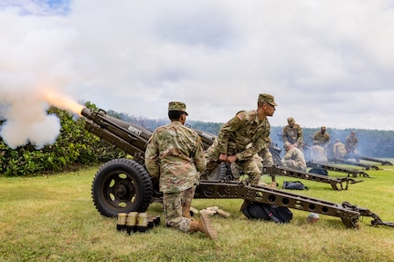 Fort Sam Houston Army Soldiers fire cannons during a Salute to the Nation ceremony, at the Joint Base San Antonio Main Flag Pole at MacArthur Parade Field at JBSA-Fort Sam Houston, Texas, July 4, 2021. The Soldiers fired 50 rounds as a salute to each of the 50 United States.