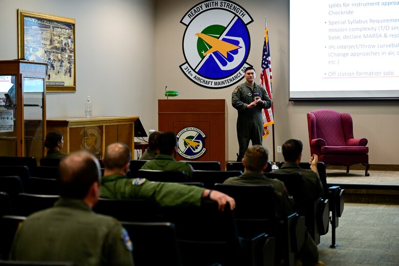 1st Lt. Donald King, 33rd Flight Training Squadron operations flight commander and first assignment instructor pilot (FAIP), answers questions from 314th Airlift Wing members
