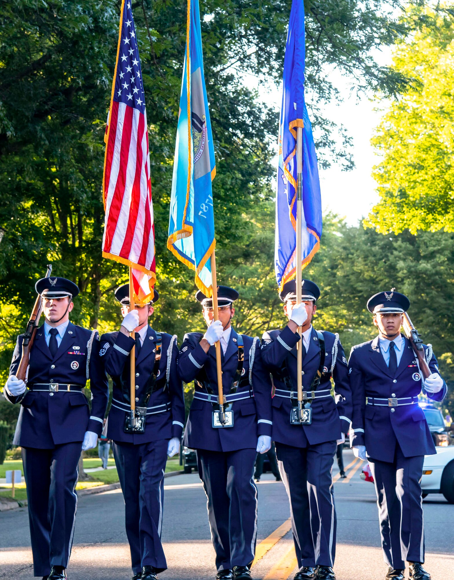 Members of the Dover Air Force Base Honor Guard march the colors during the annual Fourth of July Celebration parade in Dover, Delaware, July 4, 2021. The celebration also included a reading of the Declaration of Independence, tours of the Old State House, musical entertainment and a fireworks display. (U.S. Air Force photo by Senior Airman Stephani Barge)