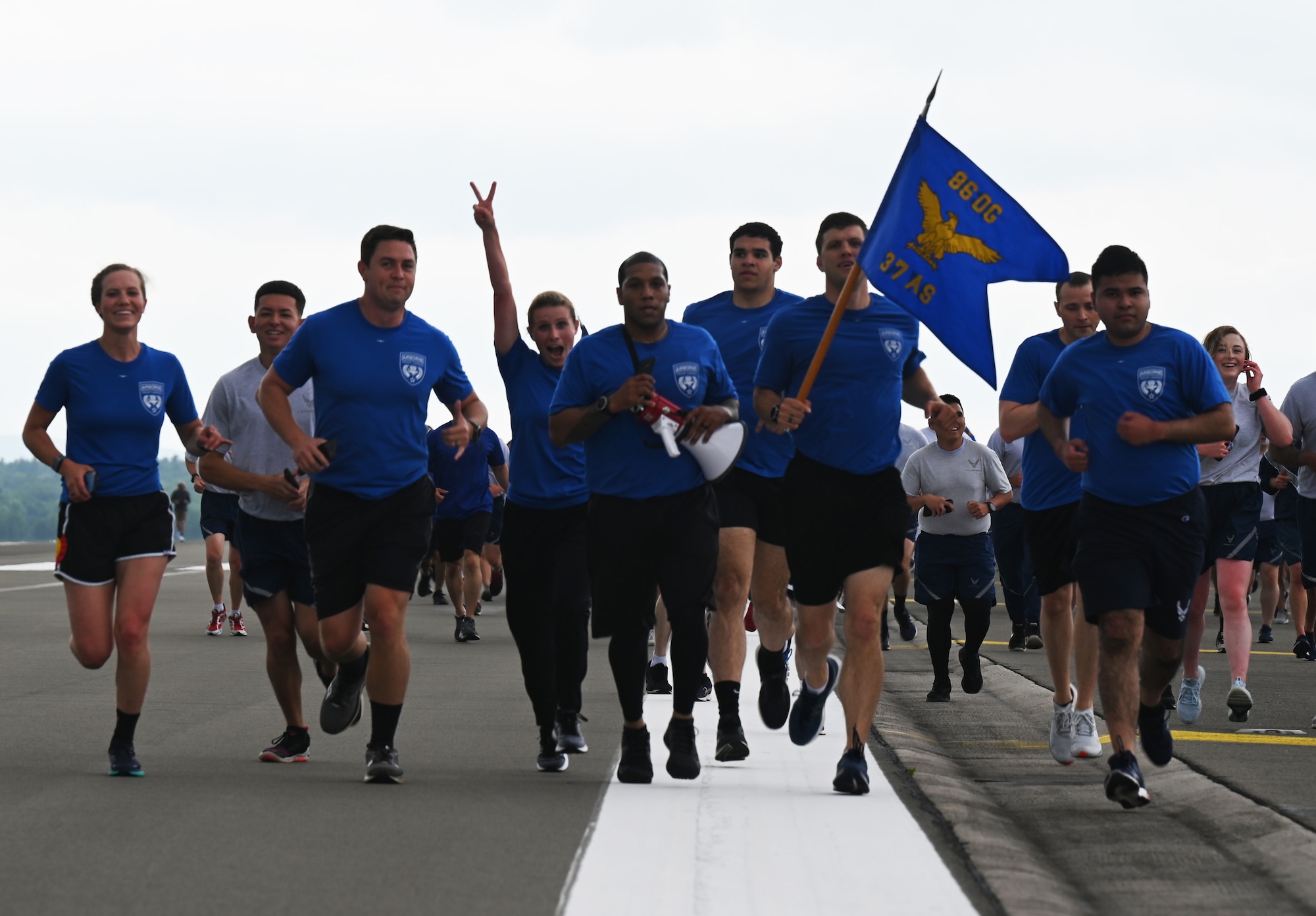 U.S. Air Force Airmen from the 37th Airlift Squadron participate in the RUNway 5K at Ramstein Air Base, Germany, July 1, 2021. Airmen from all over the 86th Airlift Wing participated in the RUNway 5K in order to increase their physical fitness. (U.S. Air Force photo by Senior Airman Thomas Karol)