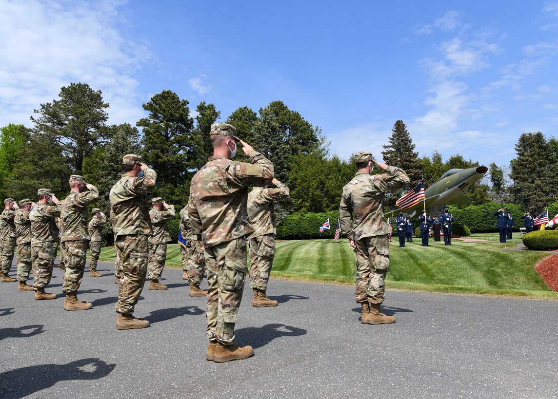 104th Fighter Wing members gather to honor their brothers and sisters in arms fallen in flight during the annual F-100 Memorial Rededication Ceremony, May 21, 2021, at Barnes Air National Guard Base, Massachusetts. A firing squad made up of Airmen from across the wing fired a 21 gun salute in honor of our fallen. The ceremony honors 13 104FW Airmen for their service and sacrifice in duty to the state and country.

It is in memory of: 
- 1st Lt. Edward W. Meacham, Monomoy Point, Massachusetts, Aug. 17, 1948
- Maj. Robert Anderstrom, Granby, Connecticut, May 7,1954 
- 1st Lt. Richard Brown, Granville, Massachusetts, Oct. 19, 1954
- Tech. Sgt. Austin A. Cooper, Granville, Massachusetts, Oct. 19, 1954
- Capt. Frank A. Gibe, Westfield, Massachusetts, July 28, 1956 
- Maj. Richard W. Mahoney, New Orleans, Louisiana, April 22, 1961 
- 1st Lt. Joseph F. Crehore, Chalons, France March 21, 1962 
- Capt. Hugh M. Lavalle, Upstate New York, Nov. 16, 1963
- Capt. John H. Paris, Westfield, Massachusetts, July 17, 1964 
- Maj. James Romanowicz, Granby, Massachusetts, Feb. 1, 1965 
- Capt. Leonard E. Bannish, Wilkes-Barre, Pennsylvania, May 30, 1968 
- Maj. John S. Southrey, Wells, New York, Sept. 17, 1968 
- Lt. Col. Morris “Moose” Fontenot Jr., Deerfield Valley, Virginia, Aug. 27, 2014

(U.S. Air National Guard photo by Senior Airman Sara Kolinski)
