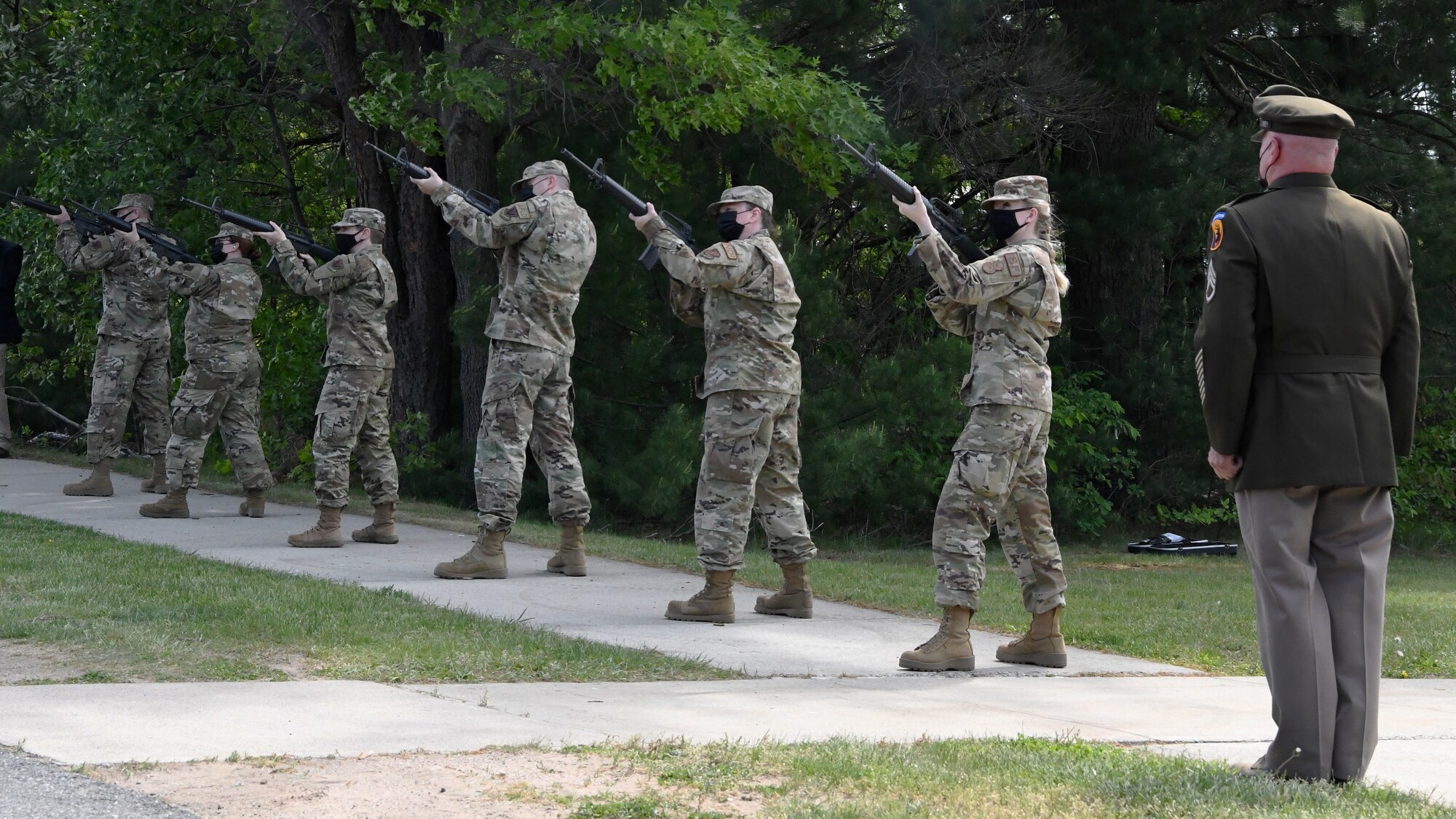 104th Fighter Wing members gather to honor their brothers and sisters in arms fallen in flight during the annual F-100 Memorial Rededication Ceremony, May 21, 2021, at Barnes Air National Guard Base, Massachusetts. A firing squad made up of Airmen from across the wing fired a 21 gun salute in honor of our fallen. The ceremony honors 13 104FW Airmen for their service and sacrifice in duty to the state and country.

It is in memory of: 
- 1st Lt. Edward W. Meacham, Monomoy Point, Massachusetts, Aug. 17, 1948
- Maj. Robert Anderstrom, Granby, Connecticut, May 7,1954 
- 1st Lt. Richard Brown, Granville, Massachusetts, Oct. 19, 1954
- Tech. Sgt. Austin A. Cooper, Granville, Massachusetts, Oct. 19, 1954
- Capt. Frank A. Gibe, Westfield, Massachusetts, July 28, 1956 
- Maj. Richard W. Mahoney, New Orleans, Louisiana, April 22, 1961 
- 1st Lt. Joseph F. Crehore, Chalons, France March 21, 1962 
- Capt. Hugh M. Lavalle, Upstate New York, Nov. 16, 1963
- Capt. John H. Paris, Westfield, Massachusetts, July 17, 1964 
- Maj. James Romanowicz, Granby, Massachusetts, Feb. 1, 1965 
- Capt. Leonard E. Bannish, Wilkes-Barre, Pennsylvania, May 30, 1968 
- Maj. John S. Southrey, Wells, New York, Sept. 17, 1968 
- Lt. Col. Morris “Moose” Fontenot Jr., Deerfield Valley, Virginia, Aug. 27, 2014

(U.S. Air National Guard photo by Senior Airman Sara Kolinski)