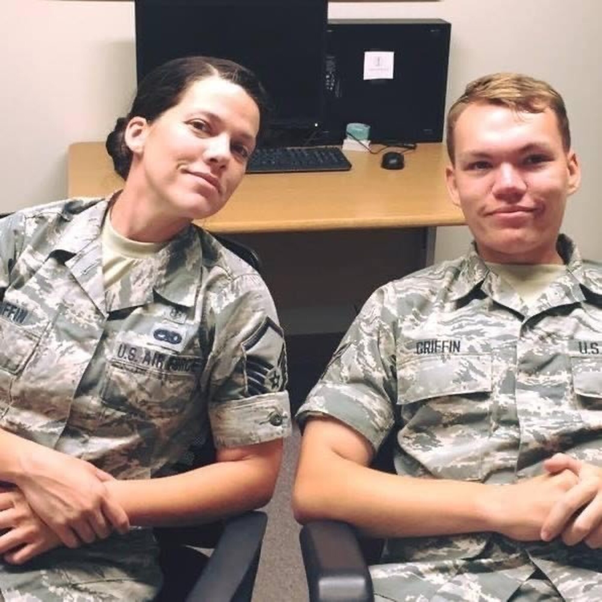 Master Sgt. Erica GriffinKing, 104th dental technician sits for a photo with her son, Chrsitopher Griffin. GriffinKing is a mother to four children and has served in the Air National Guard for 19 years. (Courtesy photo)