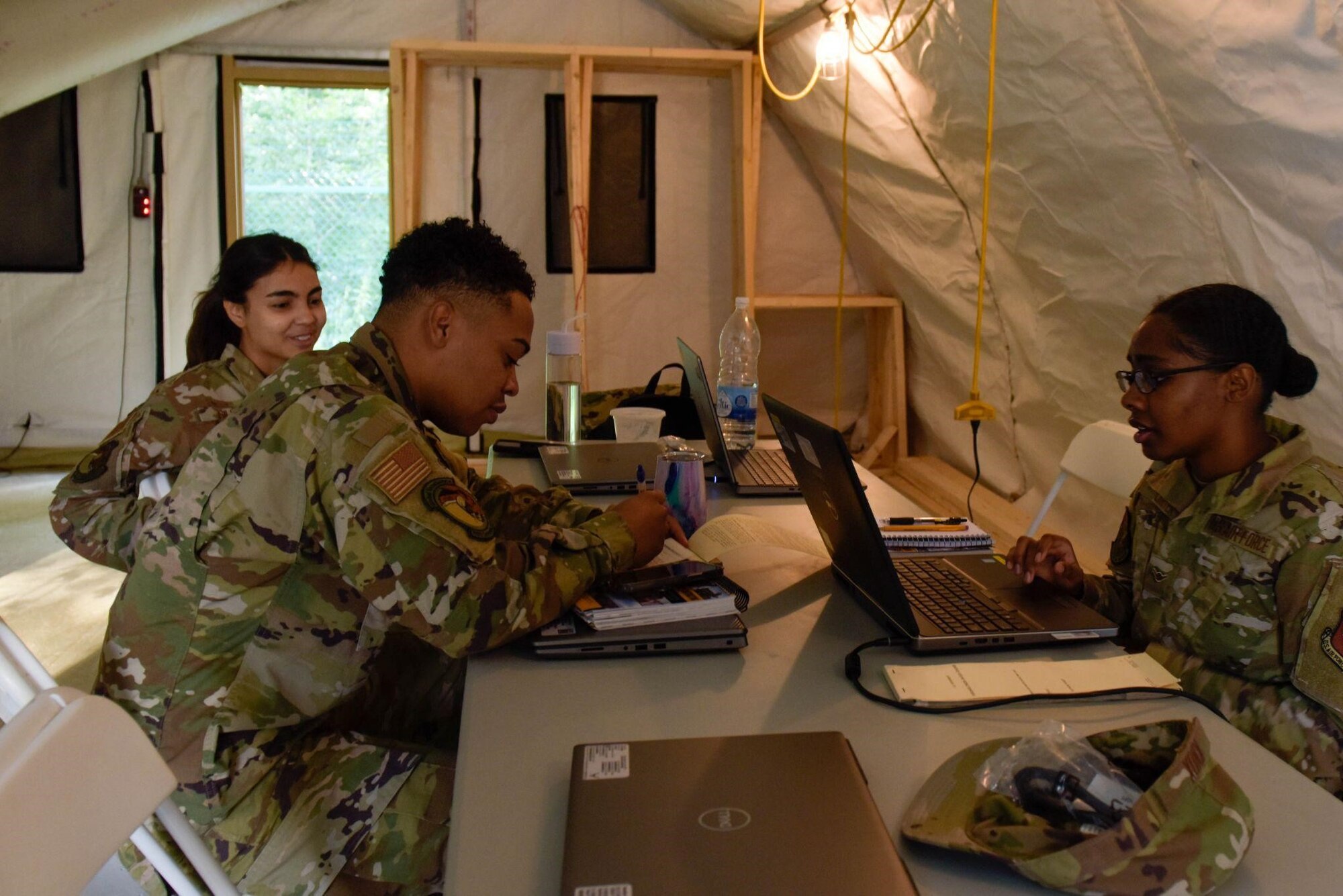 U.S. Air Force Airmen from the 700th Contracting Squadron train during a contracting exercise on Ramstein Air Base, Germany, June 28, 2021. The exercise takes place annually to give Airmen an opportunity to train in a simulated deployed environment. (U.S. Air Force photo by Airman 1st Class Madelyn Keech)