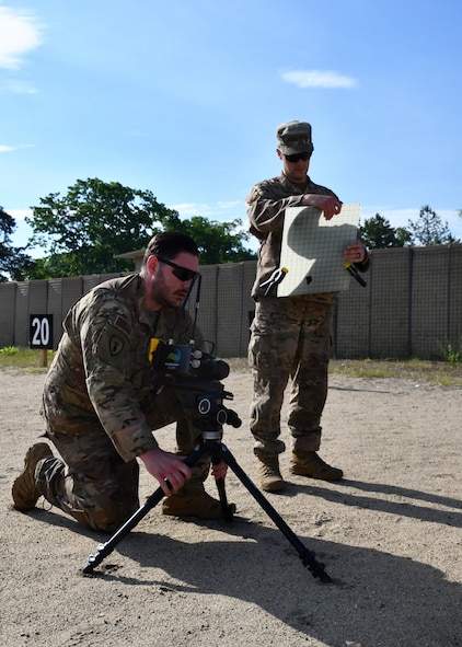 Staff Sgt. Kyle Tracy and Staff Sgt. Randy Burlingame, 104th Civil Engineering Squadron explosive ordnance disposal technicians, set up a SmartRay Vision x-ray system to see potential explosives during a scenario at Raven's Challenge Interoperability Exercise June 8, 2021, at Fort Devens Army Base, Devens, Massachusetts. The Airmen spent a week at the exercise working with civilian public safety bomb squads training in various scenarios, promoting interoperability between the agencies in operational environments while promoting teamwork and innovation.  (U.S. Air National Guard photo by Senior Airman Sara Kolinski)