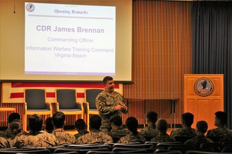 VIRGINIA BEACH, Va. (June 29, 2021) – Information Warfare Training Command Virginia Beach’s Commanding Officer Cmdr. James Brennan discuss the Navy’s information warfare community accession training pipelines and life as an information warfare officer with Midshipmen 1st Class from the United States Naval Academy. (U.S. Navy photo)