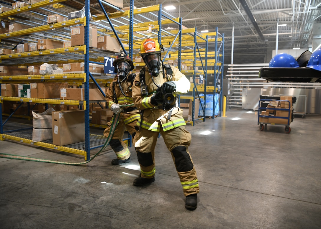 The 104th Fighter Wing held a four day Readiness Exercise June 10 - 13 at Barnes Air National Guard Base.  The REX allows all elements of the 104FW to hone their skills in support of both the State and Federal mission, ensuring the highest degree of readiness to respond to a mission at a moments notice.  The 104FW Fire Department practiced responding to and putting out a simulated fire.  (U.S Air National Guard Photos by Master Sgt. Lindsey S. Watson)