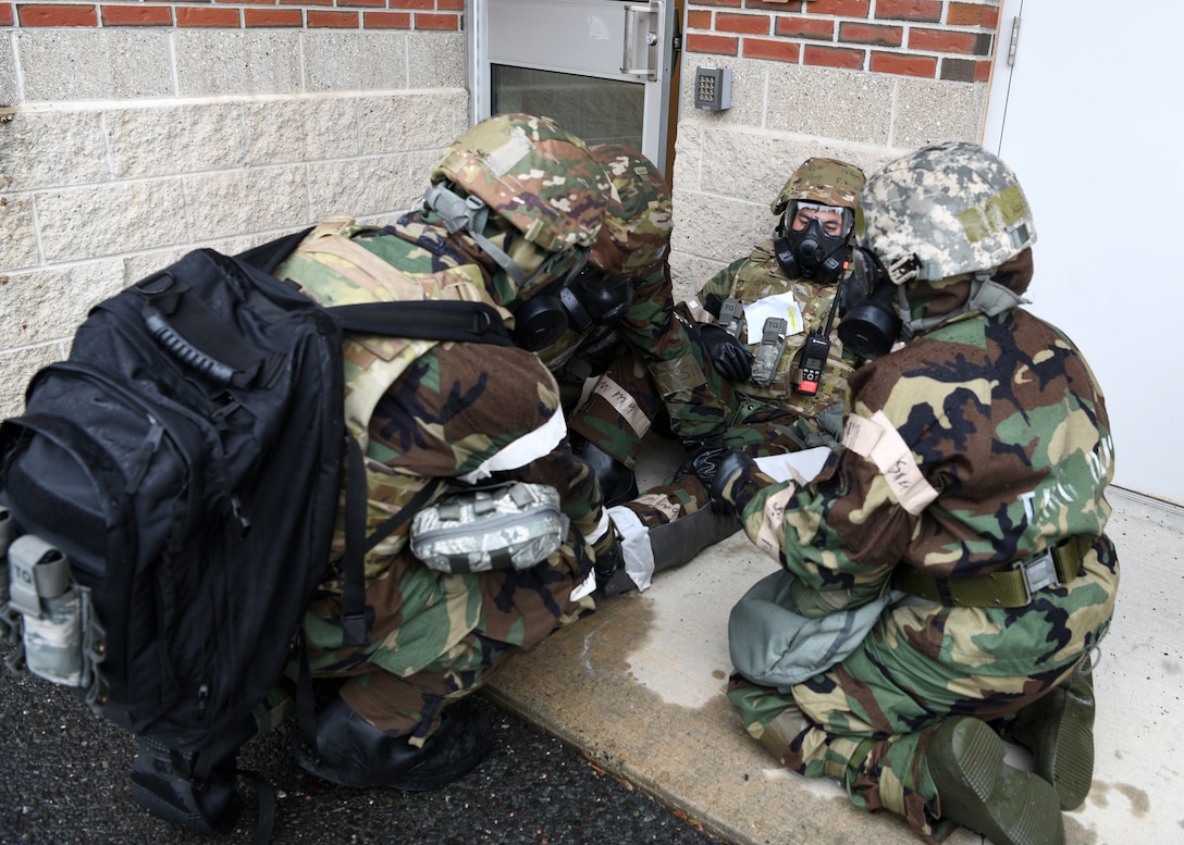 The 104th Fighter Wing held a four day Readiness Exercise June 10 - 13 at Barnes Air National Guard Base. Airmen from the 104th Medical Group assess, treat, and transport simulated injured Airmen after a simulated attack.  The REX allows all elements of the 104FW to hone their skills in support of both the State and Federal mission, ensuring the highest degree of readiness to respond to a mission at a moments notice. (U.S Air National Guard Photos by Master Sgt. Lindsey S. Watson)