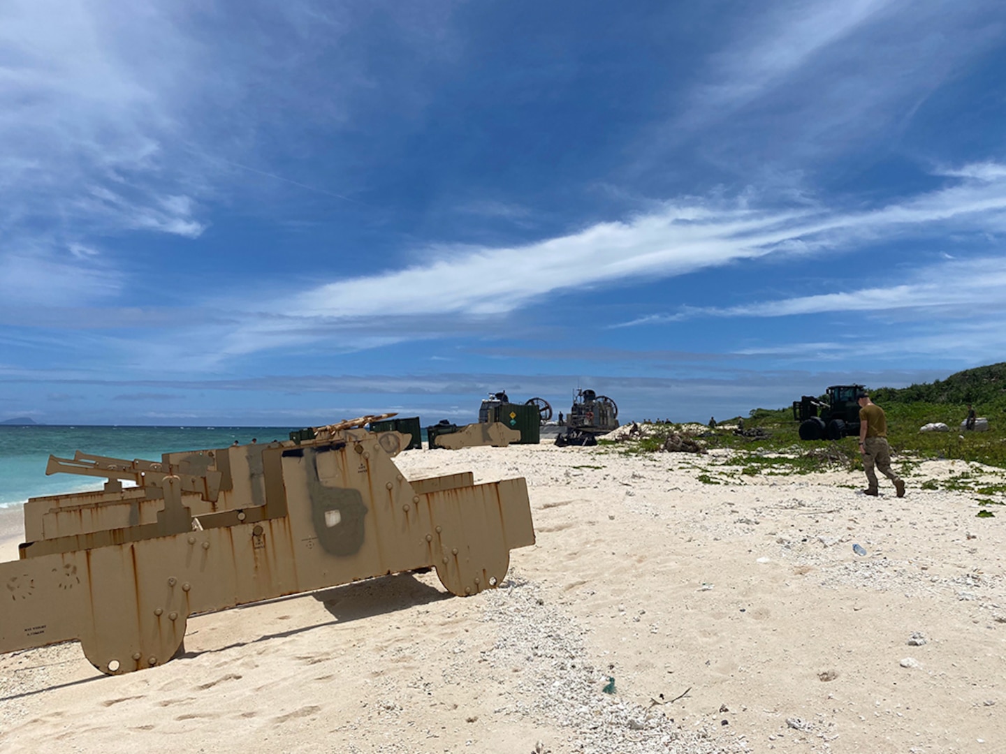 A stationary target sits on a beach