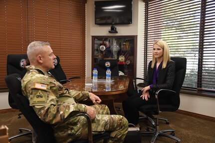 Maj. Gen. Michael Turley, adjutant general, Utah National Guard, speaks with Elizabeth Smart May 24, 2021, at Draper, Utah.