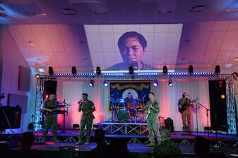 VIRGINIA BEACH, Va. (May 27, 2021) Basic course students and supporting staff members perform during the Basic Music Course popular music group capstone at the Naval School of Music.  The basic course encompasses the fundamentals of music theory and ear training as well as instrumental performance, preparing Sailors and Marines for assignment to a fleet band.  The Naval School of Music plays a vital role in developing the military musician, and its graduates go on to become musical ambassadors on ships and stations throughout the world. (U.S. Navy photo by Winston Garvey)