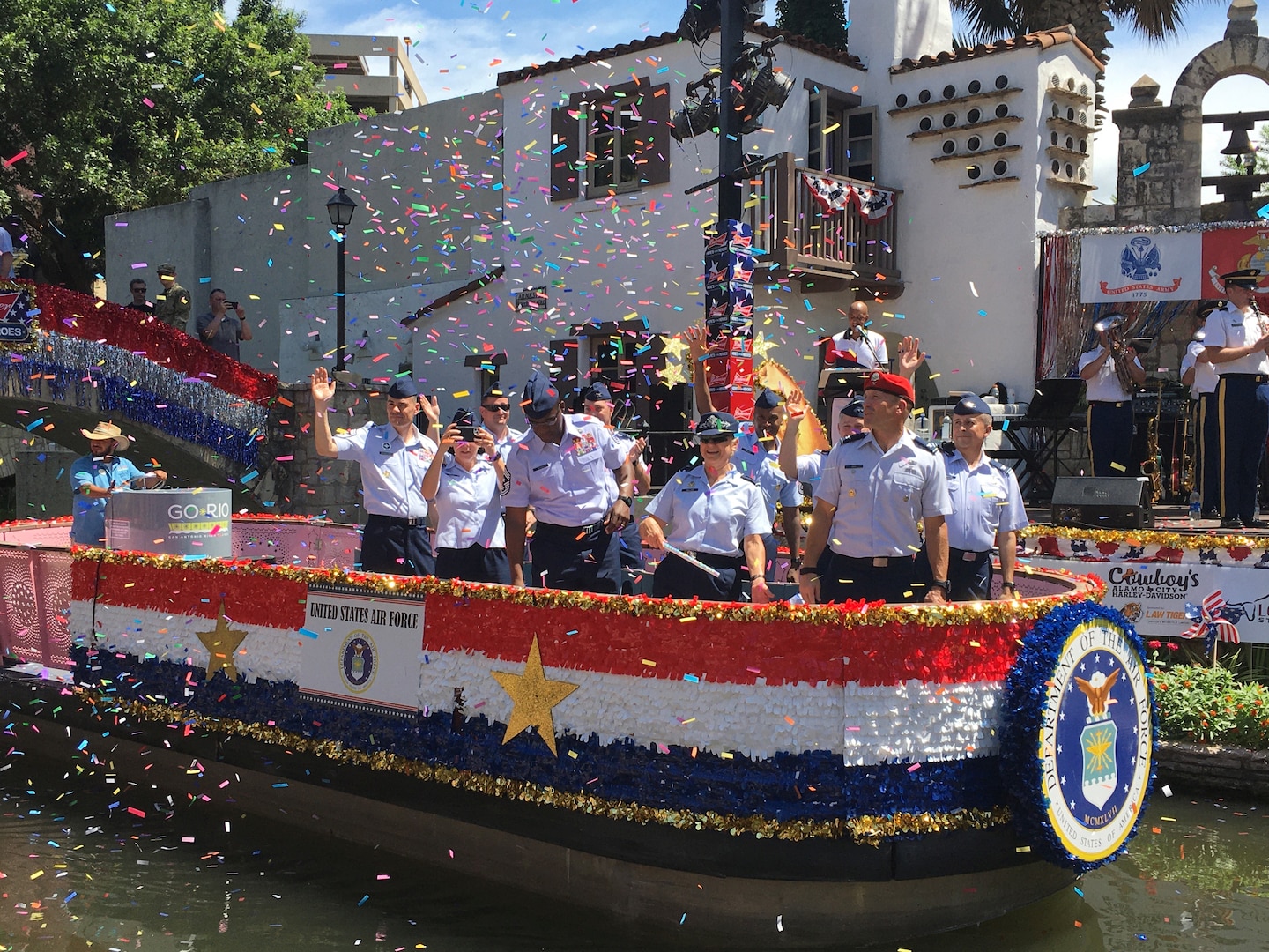 Senior Air Force leaders from Joint Base San Antonio, Texas, participate in the annual Armed Forces River Parade on the San Antonio River Walk, July 3, 2021. Col. Richard Erredge, 960th Cyberspace Wing commander, and Chief Master Sgt. Christopher Howard, 960th Cyberspace Operations Group superintendent, represented the 960th CW Gladiators during the event. (U.S. Air Force photo by Kathleen Salazar)