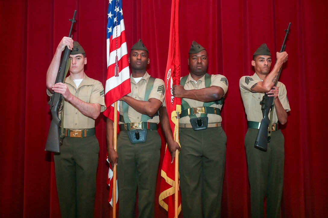 U.S. Marines with Marine Corps Base Quantico Color Guard presents Colors at the Headquarters Battalion, Training and Education Command, change of command ceremony at Breckinridge Hall on Marine Corps Base Quantico, Virginia, June 25, 2021. A change of command signifies a formal transfer of authority and responsibility for a unit from one commander to another. (U.S. Marine Corps Photo by Lance Cpl. Mitchell Johnson)