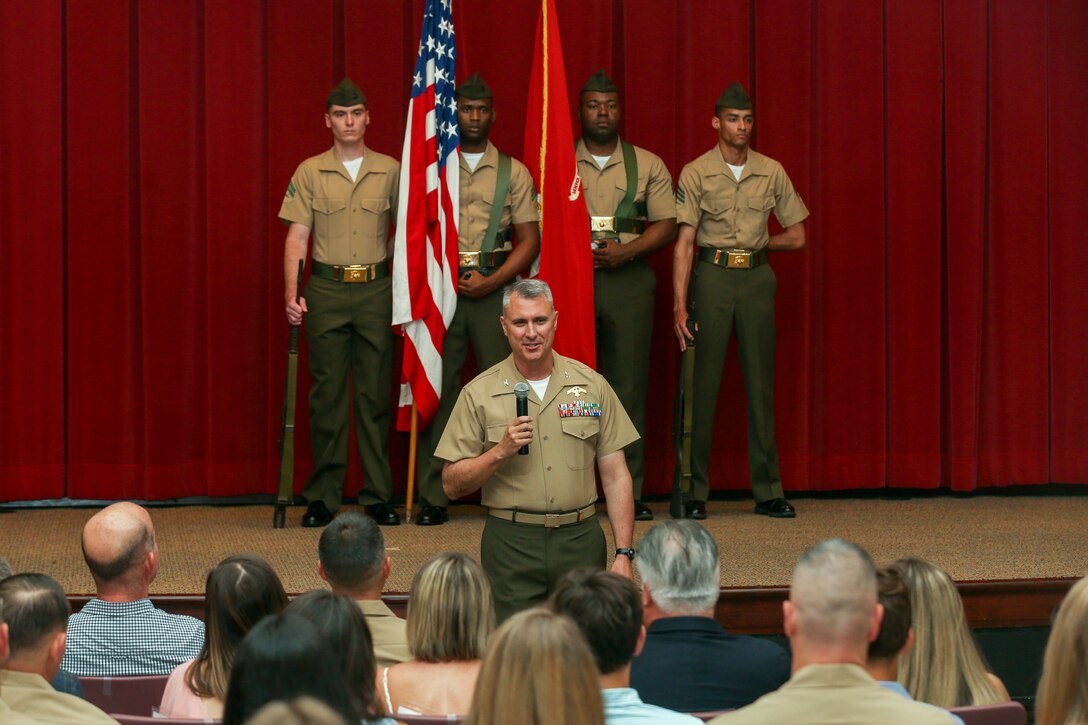 U.S. Marine Corps Col. Richard J. Schmidt, incoming commanding officer for Headquarters Battalion, Training and Education Command, speaks during the change of command ceremony at Breckinridge Hall on Marine Corps Base Quantico, Virginia, June 25, 2021. A change of command signifies a formal transfer of authority and responsibility for a unit from one commander to another. (U.S. Marine Corps Photo by Lance Cpl. Mitchell Johnson)