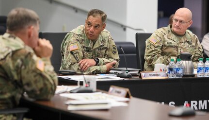 Gen. Michael X. Garrett, commanding general of U.S. Army Forces Command, and Gen. Ed Daly, commanding general of Army Materiel Command, participate in a briefing on the full range of AMC’s support to FORSCOM units and people, July 1 at AMC headquarters at Redstone Arsenal, Alabama. The two leaders, joined by key AMC staff and commanders from leaders from AMC’s 10 major subordinate commands, discussed how the materiel and installation enterprise is improving equipment on hand rates, facilitating divestiture and turn in, modernizing Army Prepositioned Stocks, enabling strategic power projection of units and improving quality of life across FORSCOM installations.