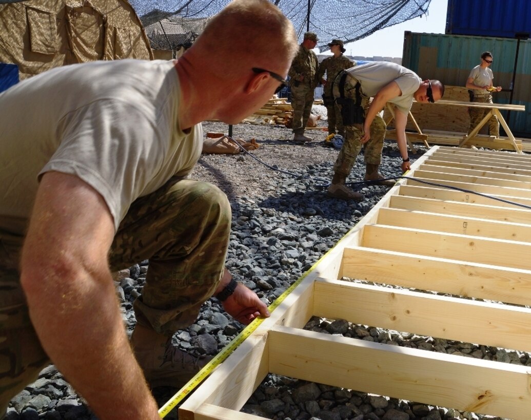 The member of the Kentucky National Guard's Agribusiness Development Team 4was helping build hardened structures to make life more comfortable for ADT 4, and eventually ADT 5 as well.