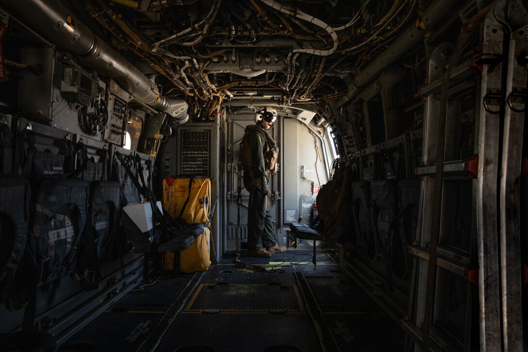 U.S. Marine Corps Lance Cpl. Louis J. Donatucci III, a tiltrotor crew chief with Marine Medium Tiltrotor Squadron (VMM) 166, Marine Aircraft Group 16, 3rd Marine Aircraft Wing, inspects the aircraft in preparation for takeoff before the final flight of the squadron at Marine Corps Air Station Miramar, California, June 30, 2021. VMM-166 conducted its final flight in preparation for deactivation in accordance with Force Design 2030, which is a plan that will ensure the Marine Corps is prepared to stand as the nation’s naval expeditionary force-in-readiness. (U.S. Marine Corps photo by Lance Cpl. Quince Bisard)