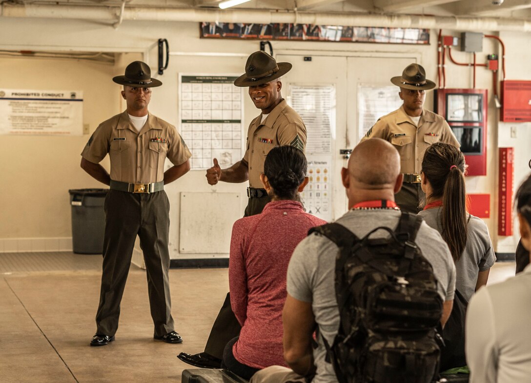 U.S. Marine Corps Staff Sgt. David J. Tyson, a senior drill instructor with B Co, 1st Recruit Training Battalion, speaks to educators participating in the Marine Corps Educator’s Workshop at Marine Corps Recruit Depot San Diego, June 22, 2021. Educator’s Workshop gives educators the opportunity to see firsthand how Marines are made and learn about the benefits the Marine Corps offers to those who earn the title. (U.S. Marine Corps photo by Sgt. Tessa D. Watts)