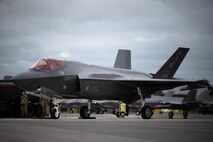An F-35A Lightning II aircraft assigned to the 355th Fighter Squadron goes through a hot pit refueling on Eielson Air Force Base, Alaska, July 7, 2021.