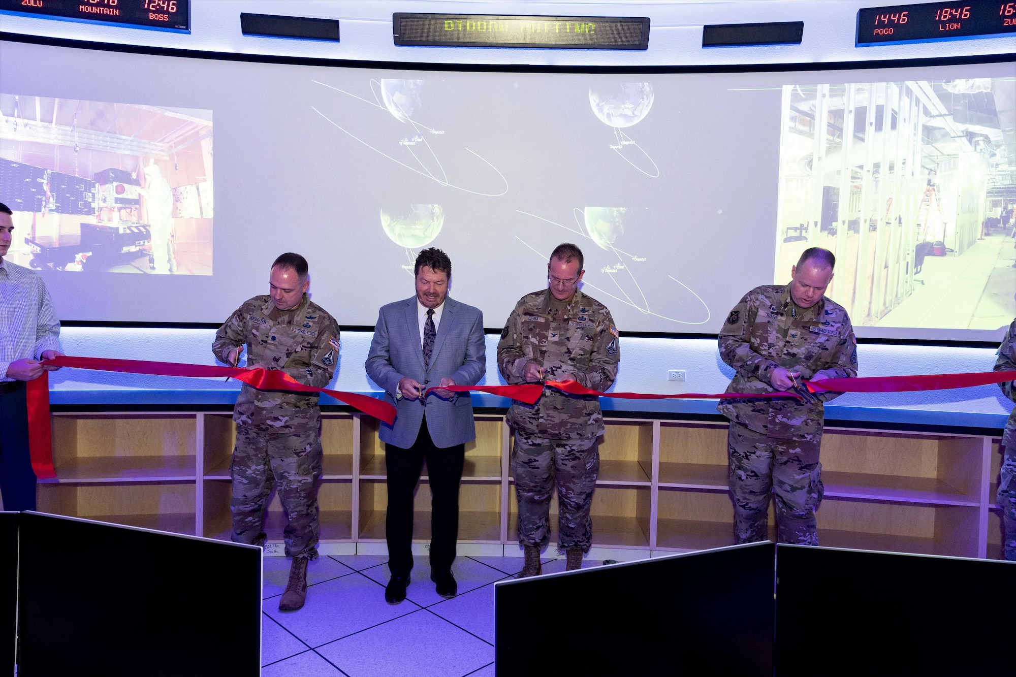 The Space and Missile Systems Center hosted a ribbon-cutting ceremony to unveil the Rendezvous and Proximity (REPR) Satellite Operations Center at Kirtland Air Force Base, N.M., Jul. 7, 2021. From left to right, pictured in the ribbon-cutting are Lt Col Brendan J. Hochstein, Development Corps Material Leader, Mr. Dan Crouch, Senior Materiel Lead of SMC’s Innovation and Prototyping Directorate, Prototype Operations Division, Col. Timothy A. Sejba, Space Development program executive officer, and Col. Joseph J. Roth, Director of SMC’s Innovation and Prototyping Directorate. The center will provide necessary infrastructure for U.S. Space Force and mission partners to prototype and experiment on orbit future space architecture. (Courtesy photo)