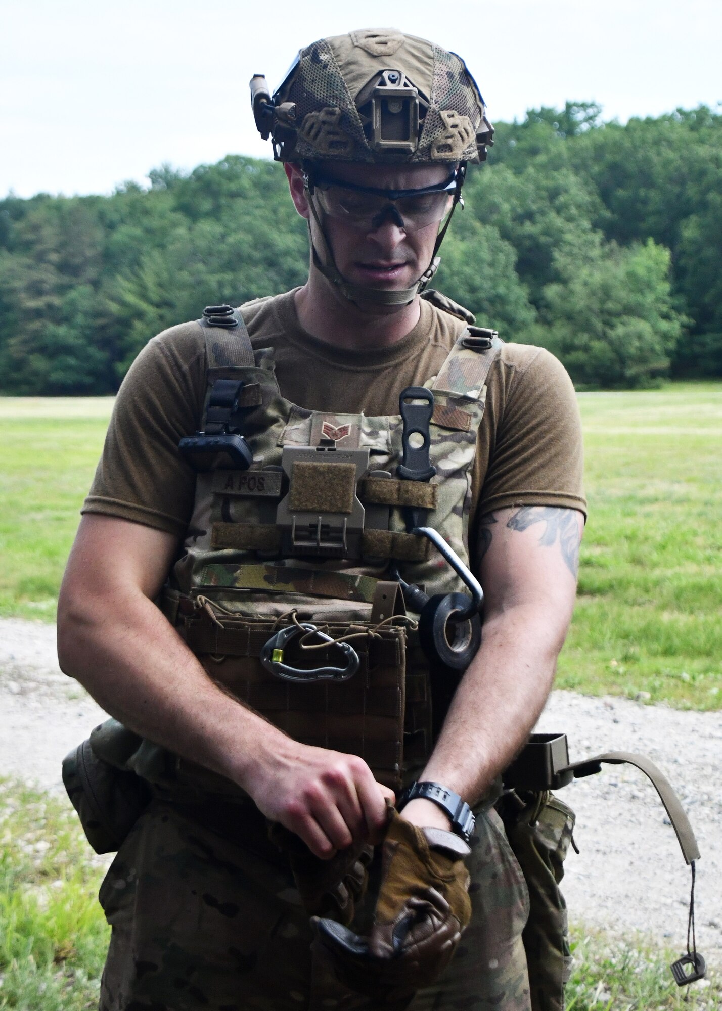 Staff Sgt. Randy Burlingame,104th Civil Engineering Squadron explosive ordnance disposal technician, prepares to take an x-ray of a potential explosive during a training scenario at Raven's Challenge Interoperability Exercise June 8, 2021, at Fort Devens Army Base, Devens, Massachusetts. The Airmen spent a week at the exercise working with civilian public safety bomb squads training in various scenarios, promoting interoperability between the agencies in operational environments while promoting teamwork and innovation.  (U.S. Air National Guard photo by Senior Airman Sara Kolinski)