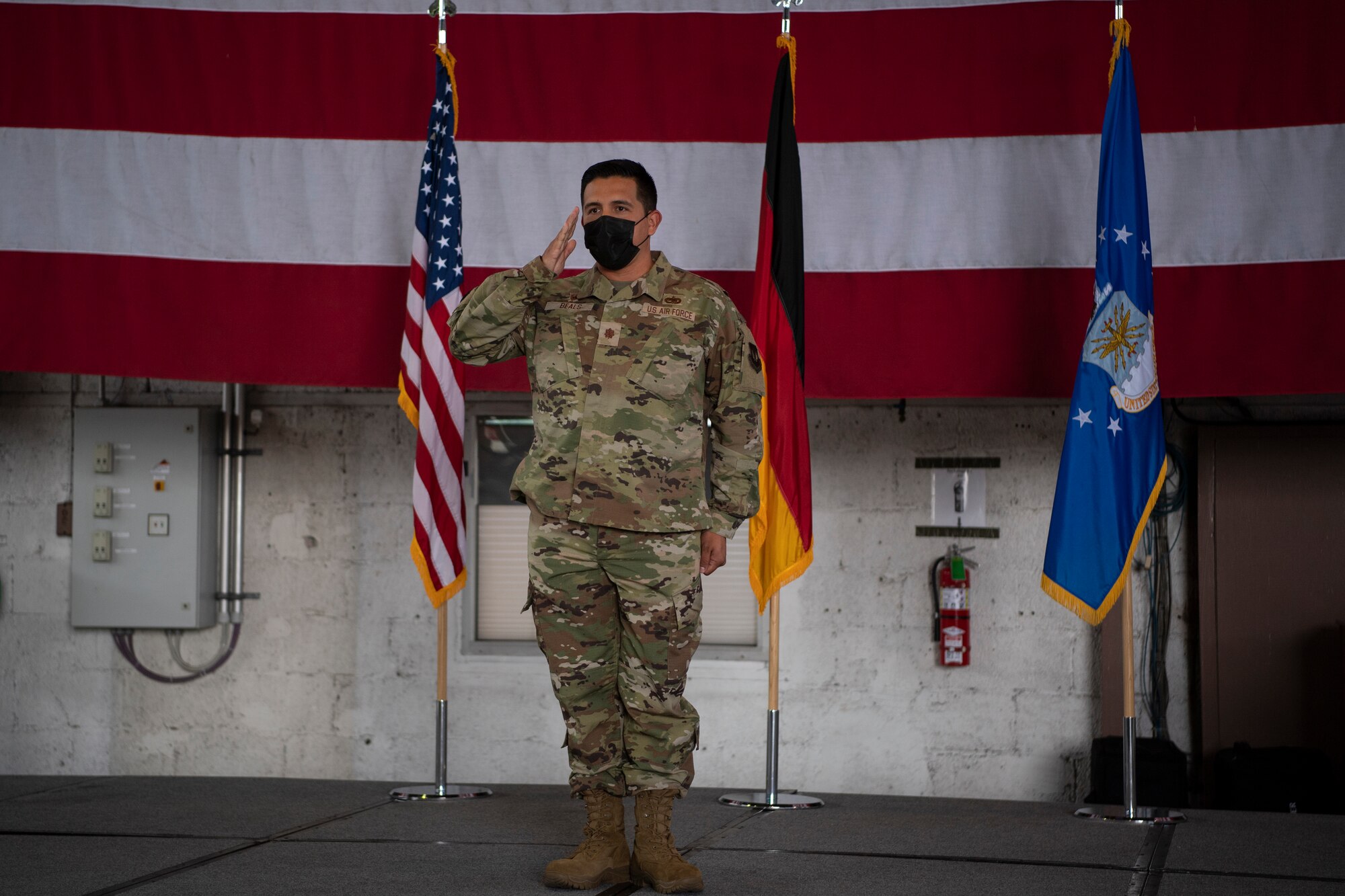 U.S. Air Force Maj. Bryan Beals, 52nd Aircraft Maintenance Squadron incoming commander, renders his first salute as the 52nd AMXS commander, July 6, 2021, on Spangdahlem Air Base, Germany. The 52nd AMXS is a part of the 52nd Maintenance Group, whose mission is to ensure adequate equipment, aircraft availability and combat ready effective pilots for all assigned missions. (U.S. Air Force photo by Staff Sgt. Melody W. Howley)