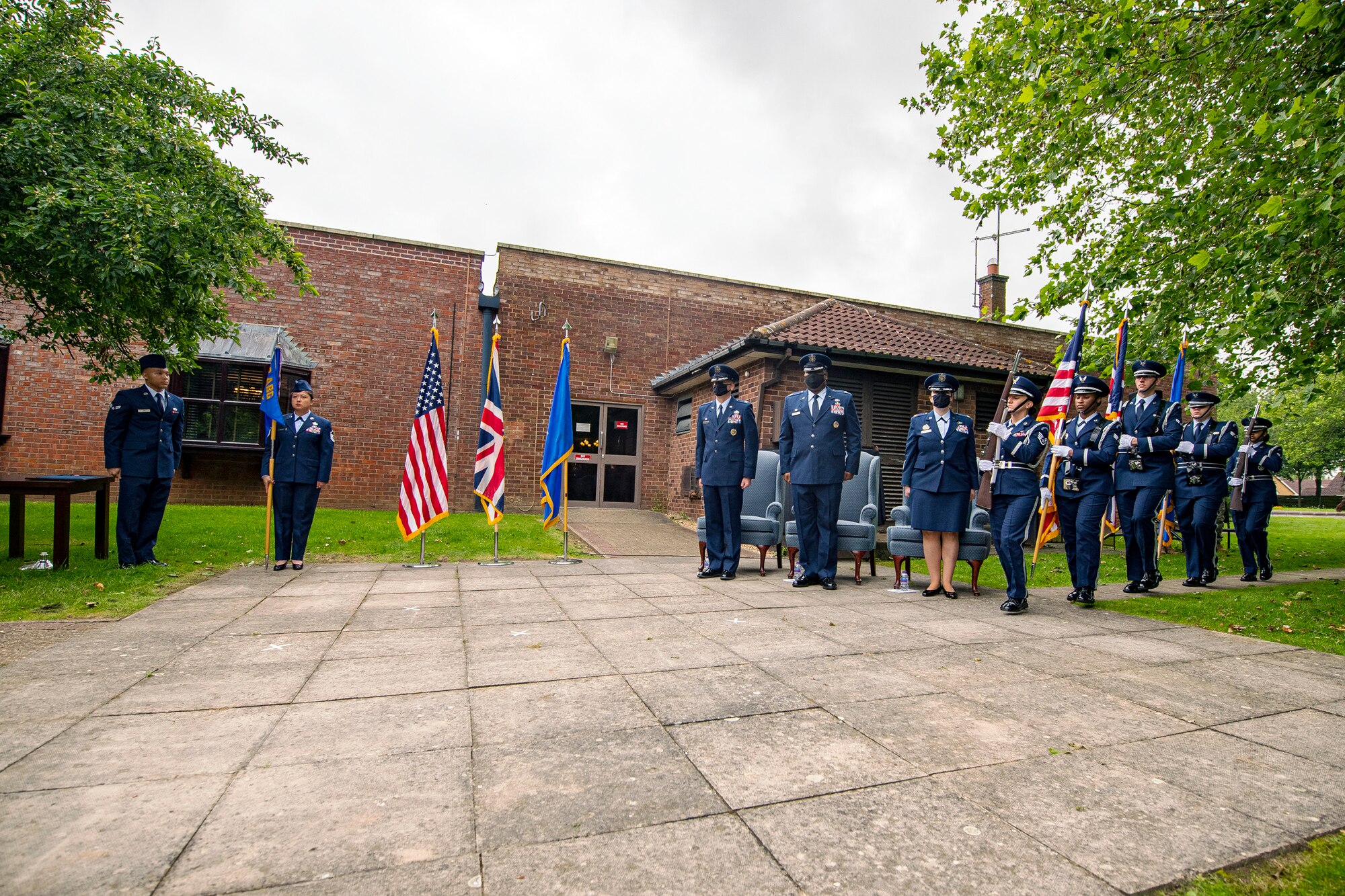 The 423rd Air Base Group base honor guard, presents the colors during a change of command ceremony at RAF Alconbury, England, July 8, 2021. During the ceremony Lt. Col. Jarvora Duncan relinquished command of the 423rd Force Support Squadron to Maj. Kirsten Nicholls. (U.S. Air Force photo by Senior Airman Eugene Oliver)