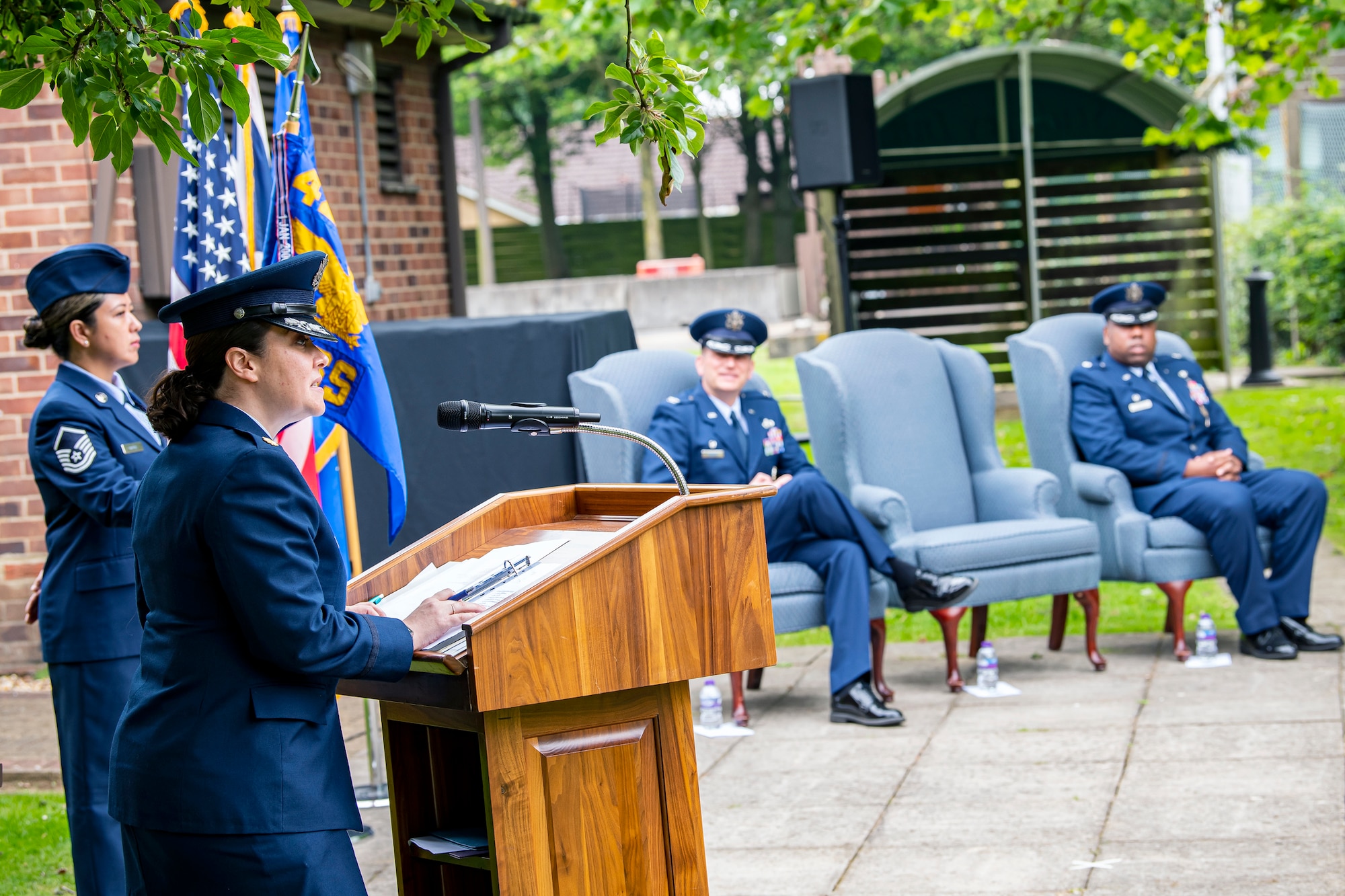 U.S. Air Force Maj. Kirsten Nicholls, center left, 423rd Force Support Squadron incoming commander, speaks during a change of command ceremony at RAF Alconbury, England, July 8, 2021. During the ceremony Nicholls assumed command of the 423rd FSS from Lt. Col. Jarvora Duncan. (U.S. Air Force photo by Senior Airman Eugene Oliver)