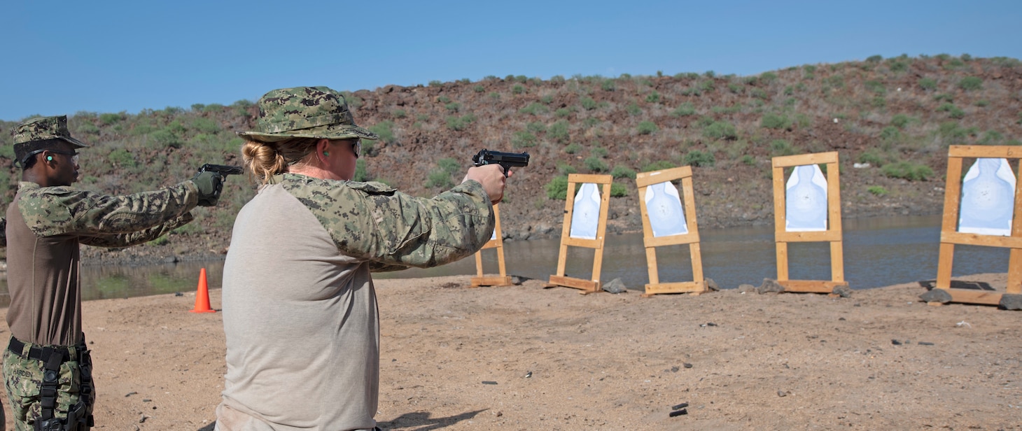 ARTA, Djibouti (June 15, 2021) U.S. Navy Master-at-Arms 1st Class Caitlin Sullivan, from Louisville, Ky., attached to Camp Lemonnier’s Security Department, trains with  the M9 service pistol at Arta Range. Arta Range is shared by multinational forces based in Djibouti, including Americans from Camp Lemonnier. Camp Lemonnier is strategically located in Djibouti, close to the Bab al-Mandab Strait, at the south end of the Red Sea. Camp Lemonnier helps U.S., allied and partner nation forces maintain security in Europe, Africa and Southwest Asia. (U.S. Navy photo by Mass Communication Specialist 1st Class Randi Brown)