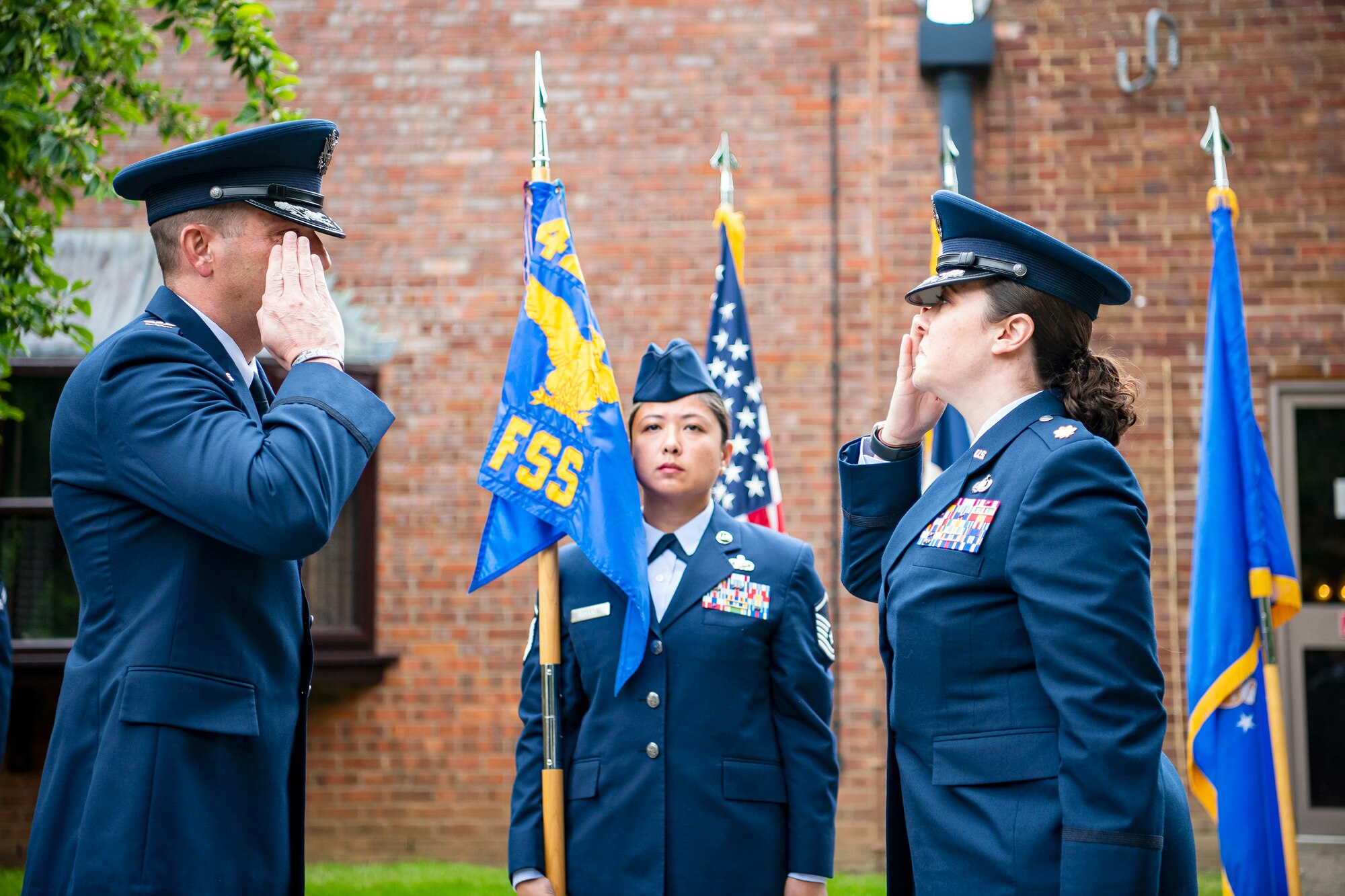 U.S. Air Force Maj. Kirsten Nicholls, 423rd Force Support Squadron incoming commander, salutes Col. Richard Martin, 423rd Air Base Group commander, after assuming command of the 423rd FSS during a change of command ceremony at RAF Alconbury, England, July 8, 2021. During the ceremony Nicholls assumed command of the 423rd FSS from Lt. Col. Jarvora Duncan. (U.S. Air Force photo by Senior Airman Eugene Oliver)