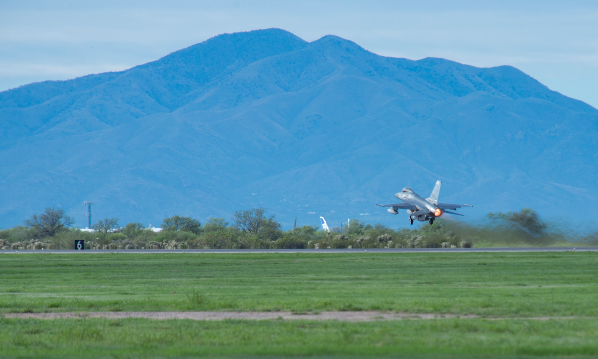 Lt. Col. Martin Meyer, director of flight test at the Aerospace Maintenance and Regeneration Group, Ariz., takes off in a rebuilt F-16 Falcon from Davis-Monthan Air Force Base to Cecil Field, in Jacksonville, Fl., so the aircraft can be modified into a QF-16. Using the QF-16 as an aerial target gives the warfighter the most realistic approach to a real world mission profile.  (U.S. Air Force photo by Tech. Sgt. Perry Aston)