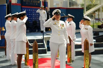 PENSACOLA, Fla. (June 25, 2021) Information Warfare Training Command (IWTC) Corry Station’s Command Master Chief Jodi Gibson is piped ashore for the last time during her retirement ceremony at National Aviation Museum, Naval Air Station Pensacola, Florida. (U.S. Navy photo by Chief Aviation Ordnanceman Kenneth J. Stanford/Released)