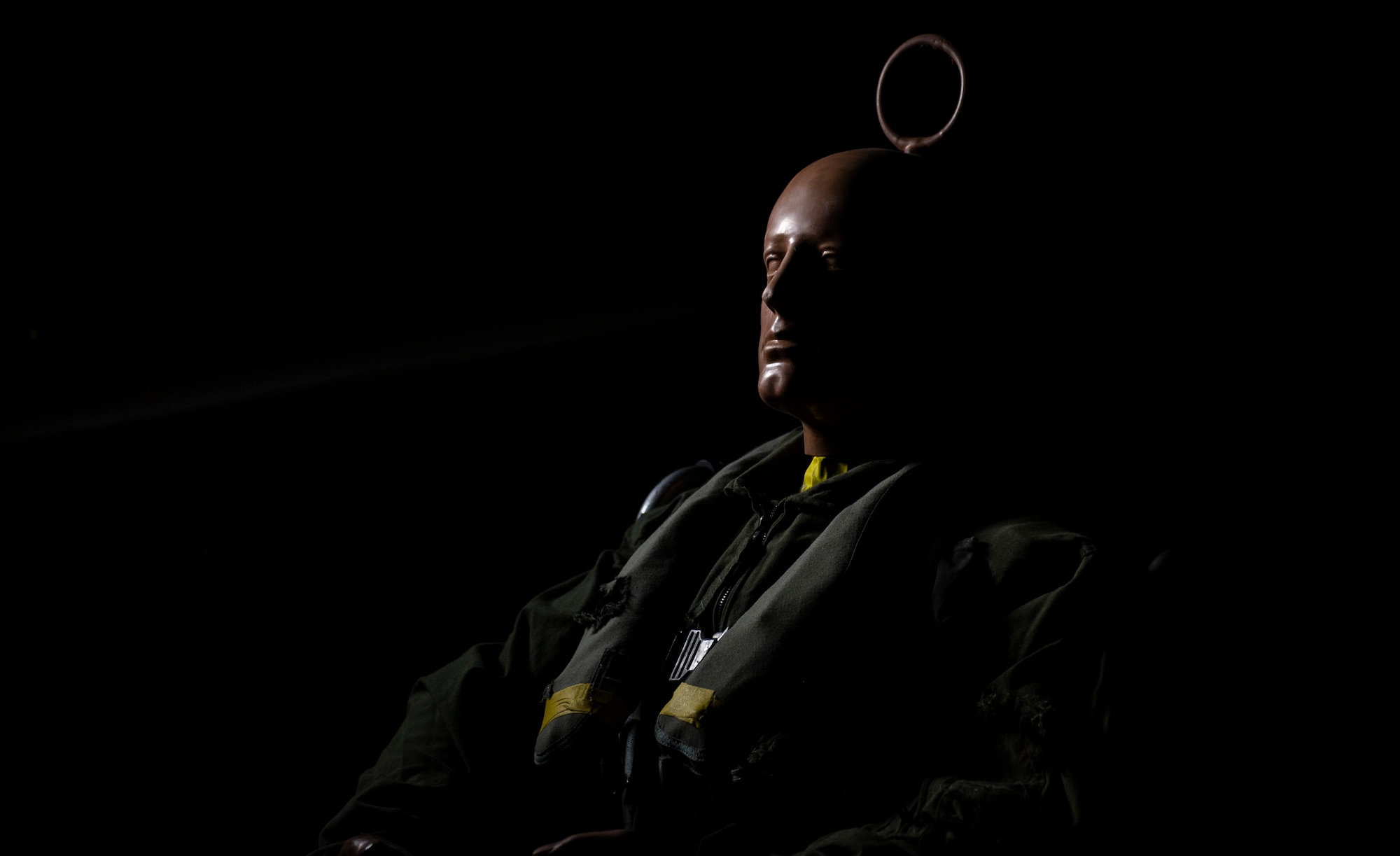 Full-scale anthropomorphic test devices (ATD) that simulates the dimensions, weight proportions and articulation of the human body, and is usually instrumented to record data about the dynamic behavior of the ATD in simulated ejections. (U.S. Air Force photo by Tech. Sgt. Perry Aston)