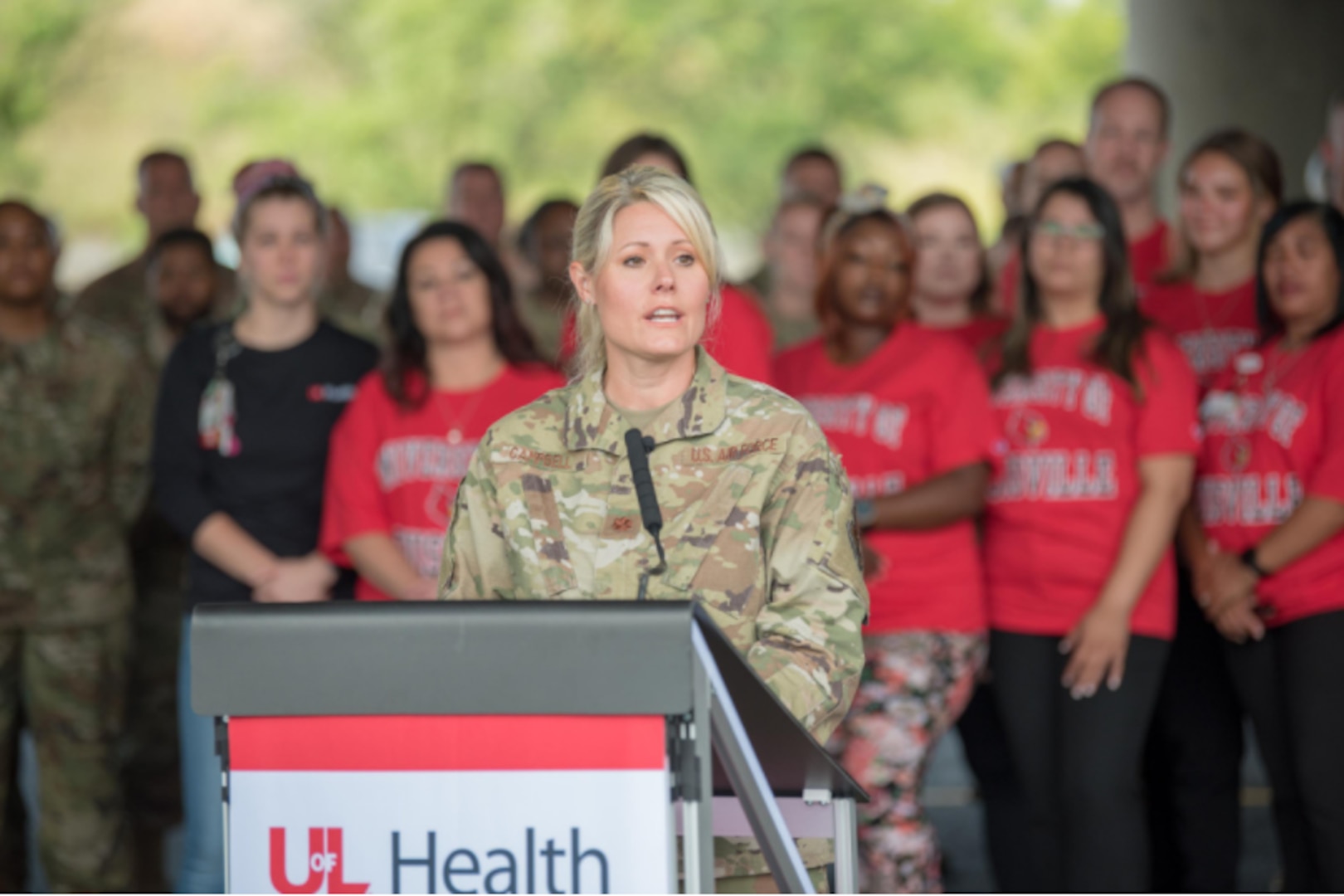 Maj. Tiffany Campbell, officer-in-charge of a Kentucky National Guard team that has supported a drive-thru COVID testing and vaccination site for 15 months, speaks during a ceremony to mark its closure in downtown Louisville, Kentucky, on June 30, 2021.