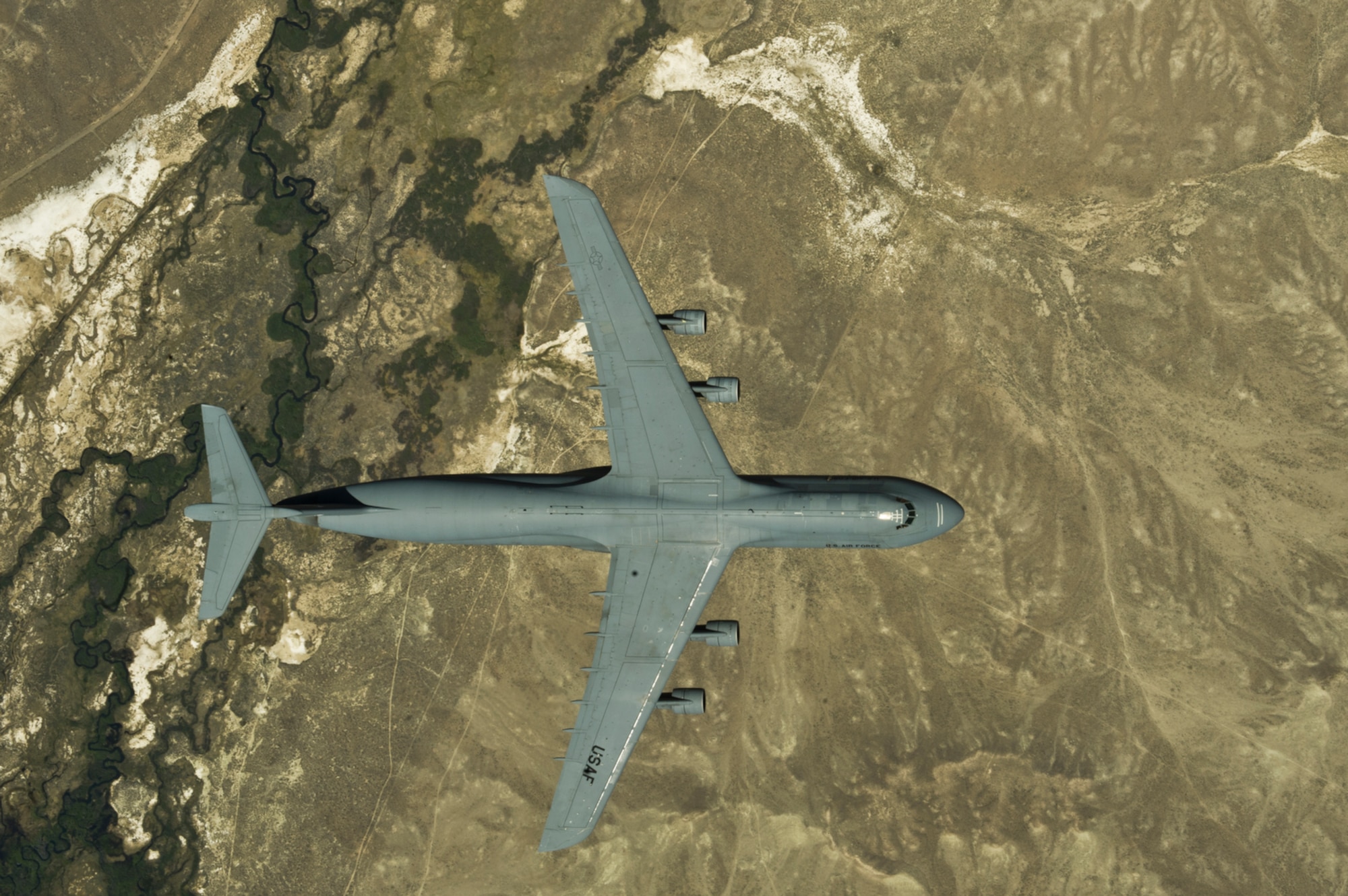 A C-5 Galaxy form Travis Air Force Base, Calif. after a refuel from a KC-135R Stratotanker from the 191st Air Refueling Squadron, 151st Air Refueling Wing with the Utah Air National Guard. The 151st Air Refueling Wing routinely supports air operations across the western United States. (U.S. Air Force photo/Staff Sgt. Stephany Richards)