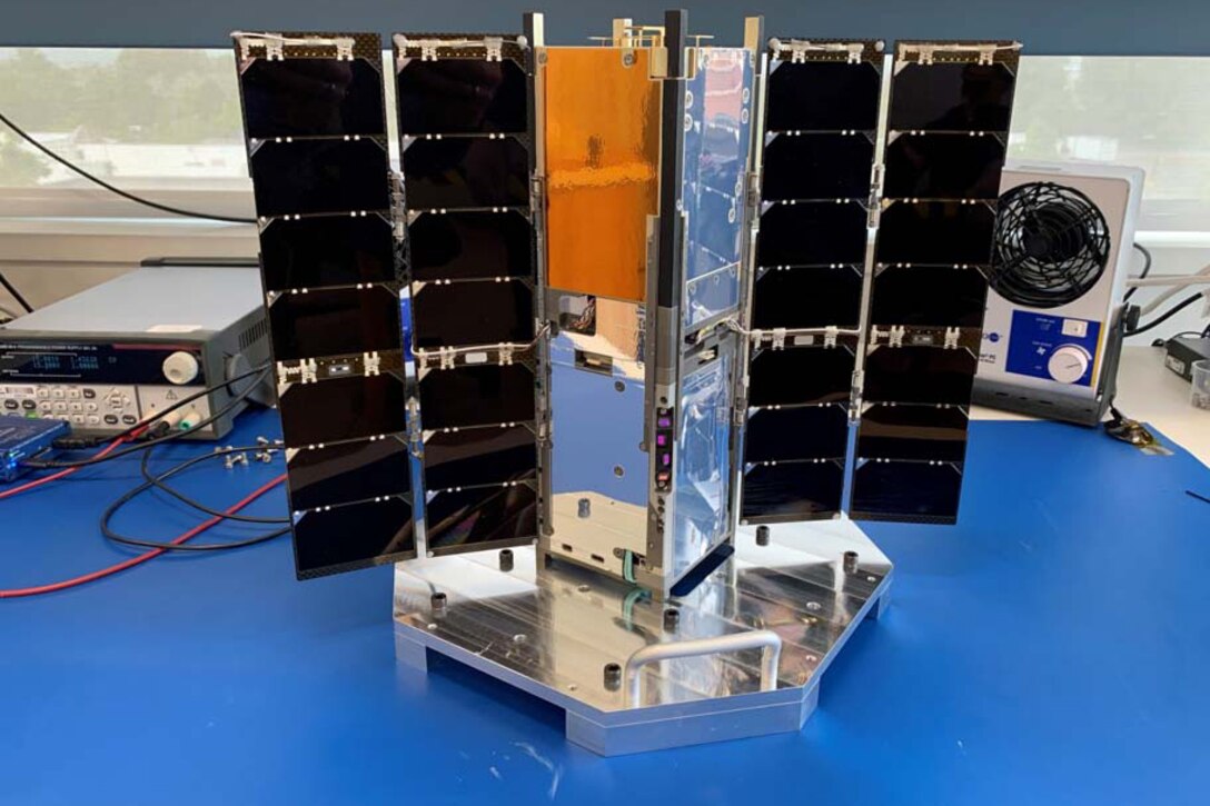 A photo shows a satellite.