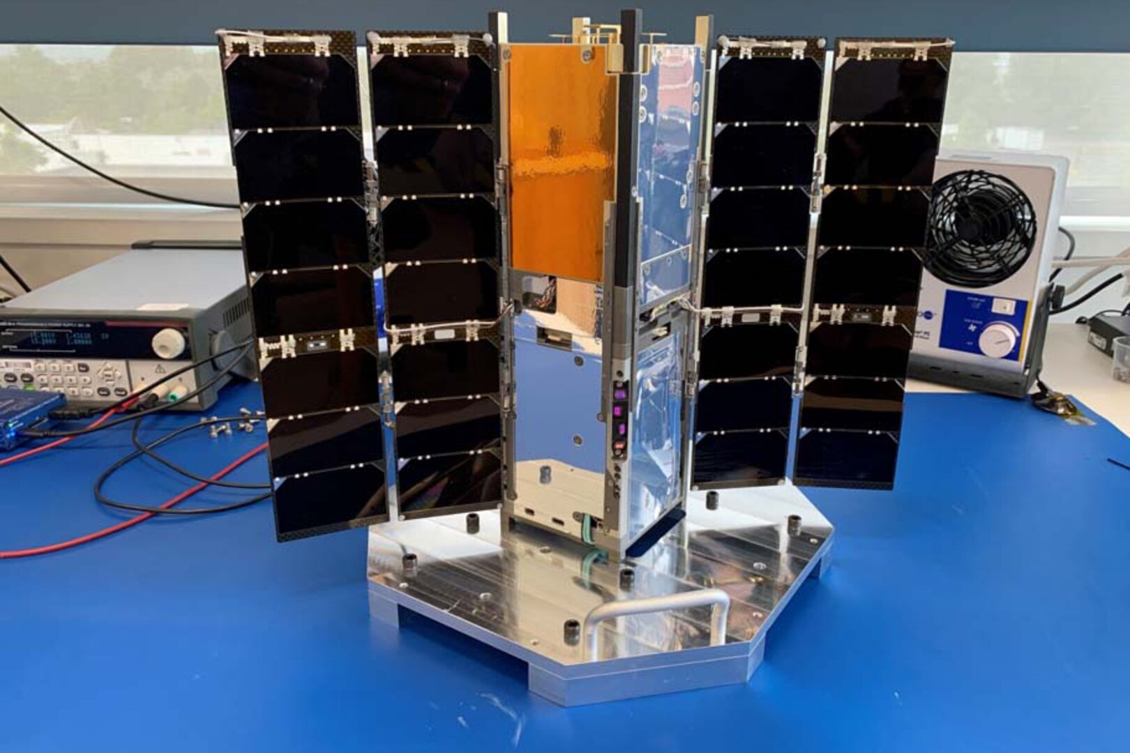 A photo shows a satellite.