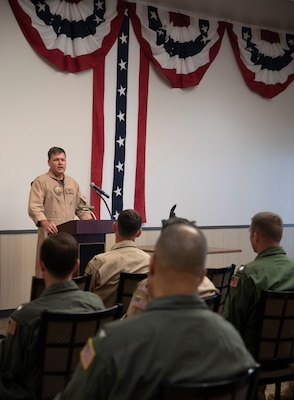 CORPUS CHRISTI, Texas (July 7, 2021) Chief of Naval Air Training Rear Adm. Robert Westendorff speaks after accepting the Adm. James S. Russell Naval Aviation Flight Safety Award from National Commander of the Order of the Daedalians retired Air Force Maj. Gen. Jerry Allen during a ceremony at Naval Air Station Corpus Christi, July 7. The award is a companion to the Navy Safety Center's Naval Aviation Readiness Through Safety Award. Selection for these annual awards is based on units' mishap rates, flight exposure, safety trends over the past three years, and aviation safety management system. (U.S. Navy photo by Lt. Michelle Tucker/Released)