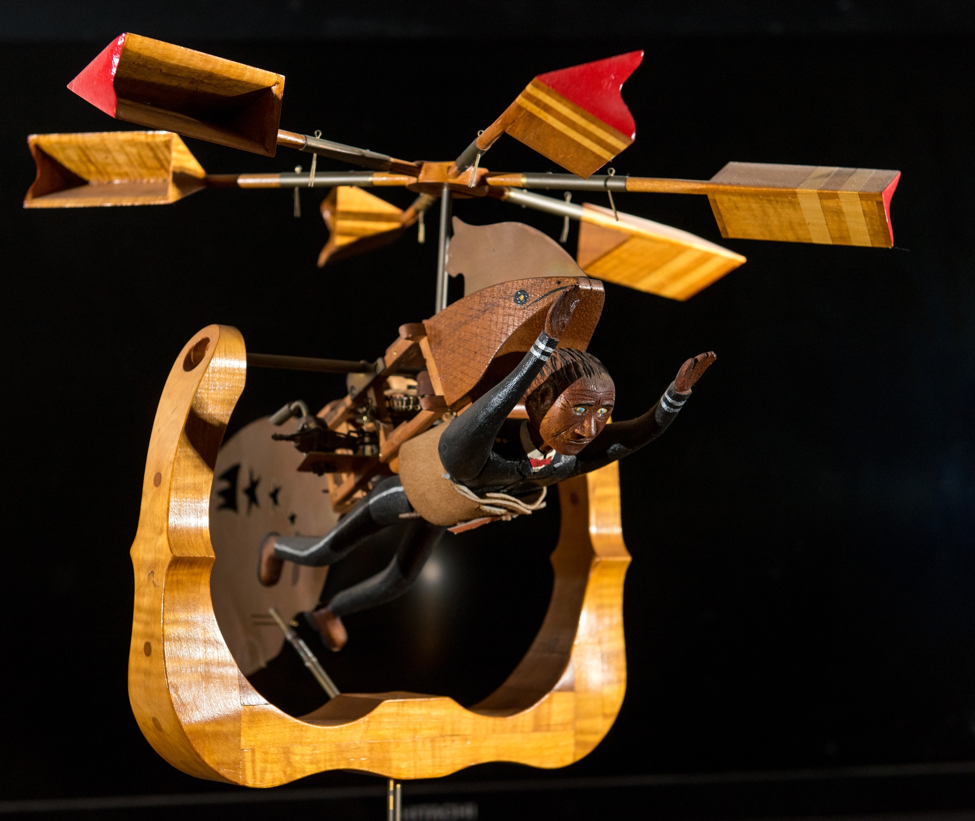 A wind driven mechanical folk art creation by retired U.S. Air Force Master Sgt. Daniel Holmes, rests on a shelf at his home in Lowell, Mass., Jun. 1, 2018. Holmes utilizes his art to teach Airmen various electronic and mechanical skills not taught during their technical training in order for them to maintain 1960's era technology used  at the Sagamore Hill Solar Observatory of the 2nd Weather Squadron, Det. 2, in Hamilton, Mass. (U.S. Air Force photo by J.M. Eddins Jr.)