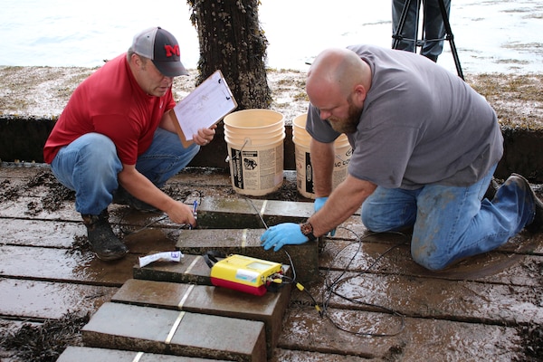 Engineers from the U.S. Army Engineer Research and Development Center’s Geotechnical and Structures Laboratory, located in Vicksburg, Mississippi, test non-destructive sustainable concrete materials at ERDC’s field exposure site at Treat Island, Maine.