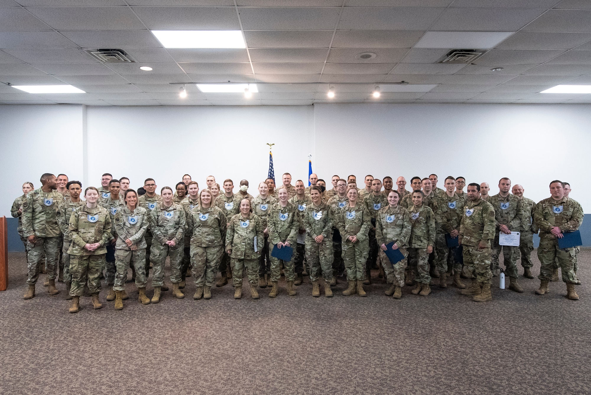 Members of Team Wright-Patt selected for promotion pose for a group photo during 2021 Technical Sergeant Release Party inside the Hope Hotel at Wright-Patterson Air Force Base, Ohio, June 30, 2021. This year 26.94% of those eligible were promoted to the next rank. (U.S. Air Force photo by Wesley Farnsworth)