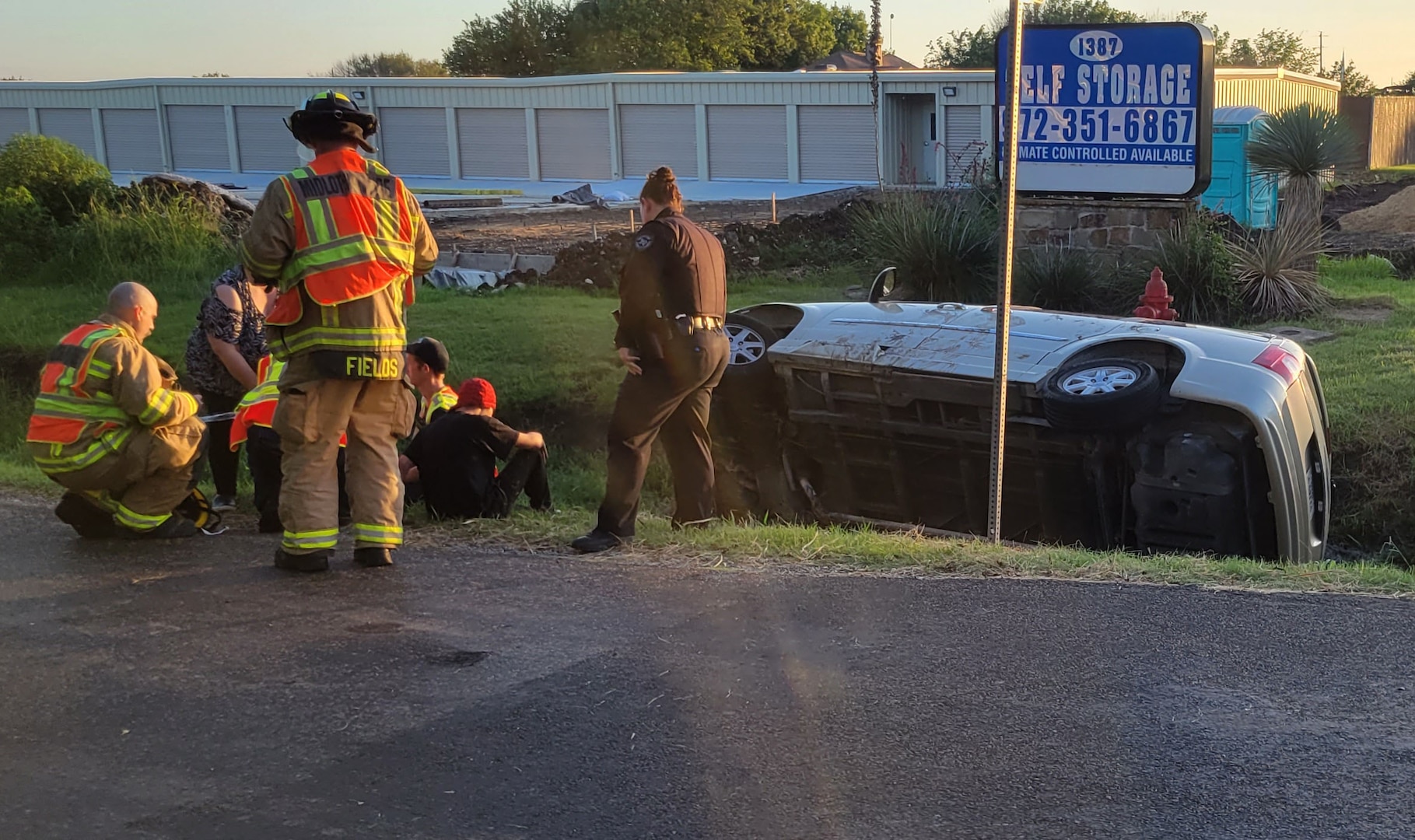 Marine rescues children from overturned vehicle