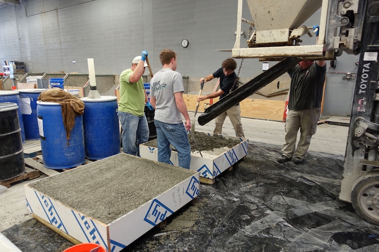 Engineers from the U.S. Army's Engineer Research and Development Center’s Geotechnical and Structures Laboratory, located in Vicksburg, Mississippi, fabricate concrete slabs and overlays using sustainable concrete materials.