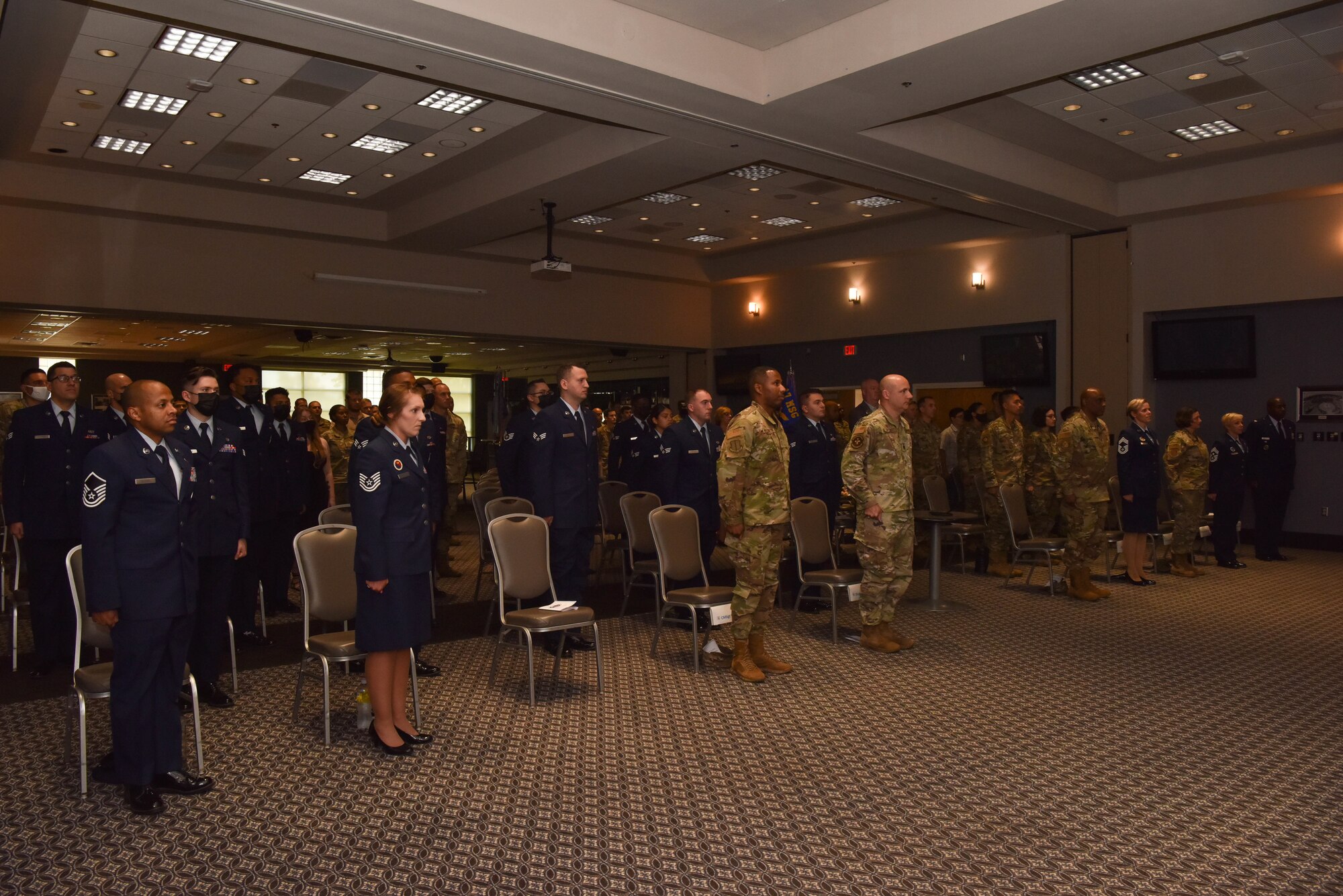 Goodfellow members celebrate the graduates from Airman Leadership School, Class 21-E, on Goodfellow Air Force Base, Texas, July 8, 2021. Class 21-E graduated 15 Airmen into front-line supervisors. (U.S. Air Force photo by Senior Airman Jermaine Ayers)
