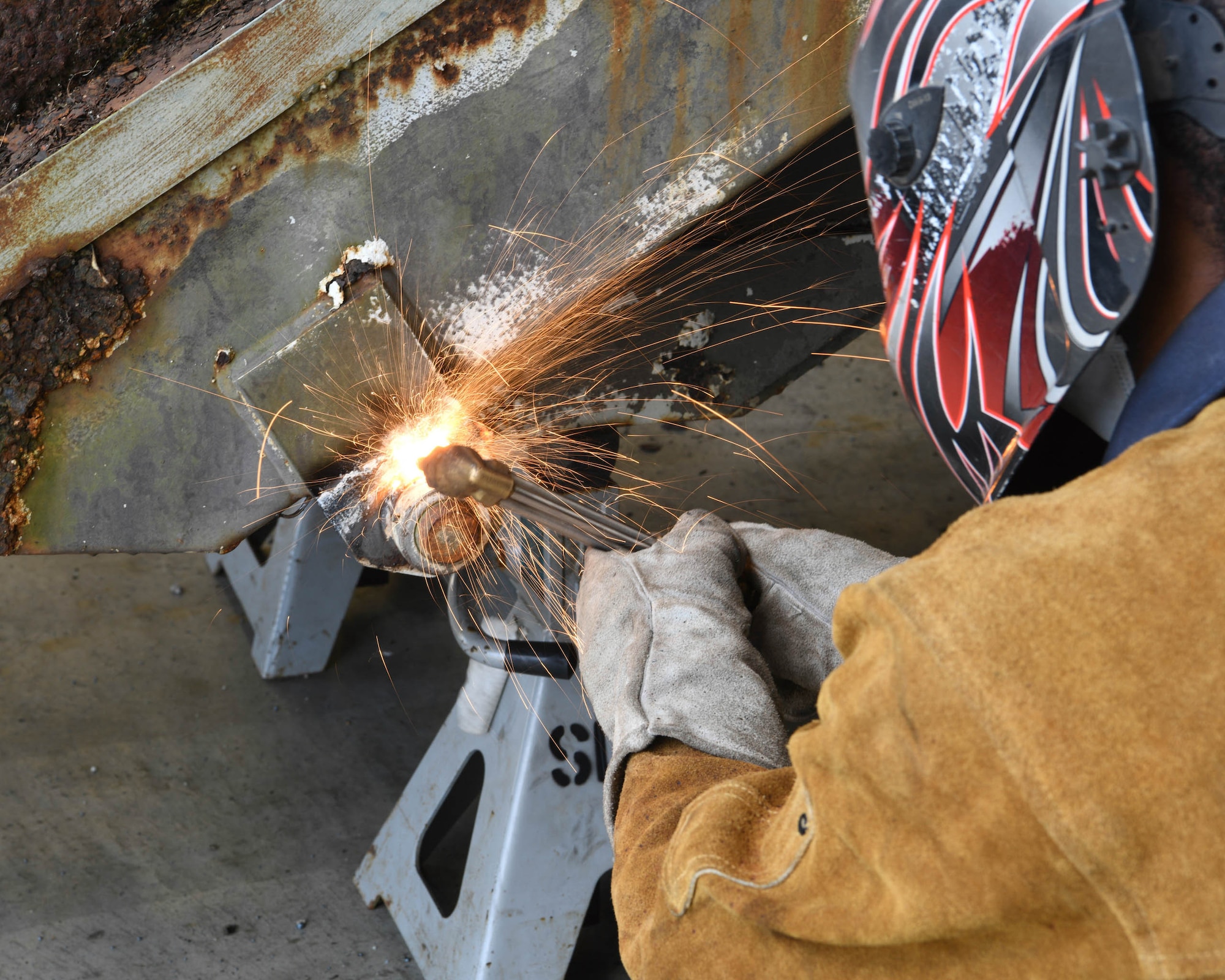 Special Purpose technicians work on disassembling a staircase truck at Kadena Air Base, Japan, June 16, 2021.