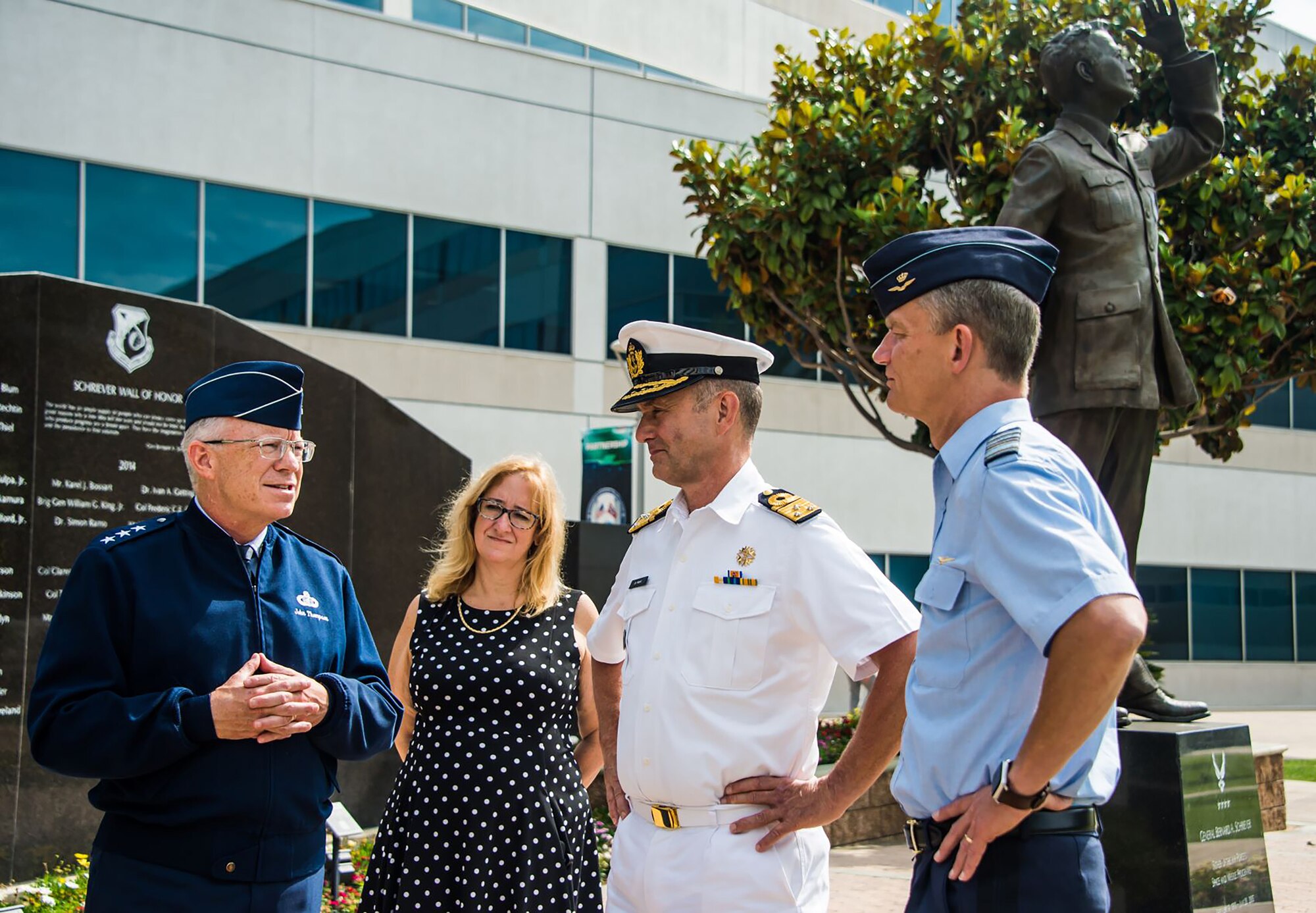 U.S. Air Force Lt. Gen. John F. Thompson, Space and Missile Systems Center commander and Air Force Program executive officer for Space, and Deanna Ryals, Chief Partnership Officer, meet with Vice Admiral Aire de Waard, the Netherlands director of Defence Material Organization, and Lt. Gen. Dennis Luyt, commander of the Royal Netherlands Air Force, before the start of an international partnership meeting at Los Angeles Air Force Base, California, July 8, 2021. The U.S. government is looking to broaden collaboration and partnerships with the Netherlands in several military space mission areas growing from our strong collaboration in MILSATCOM and responsive space capabilities. (U.S. Space Force photo by Van Ha)